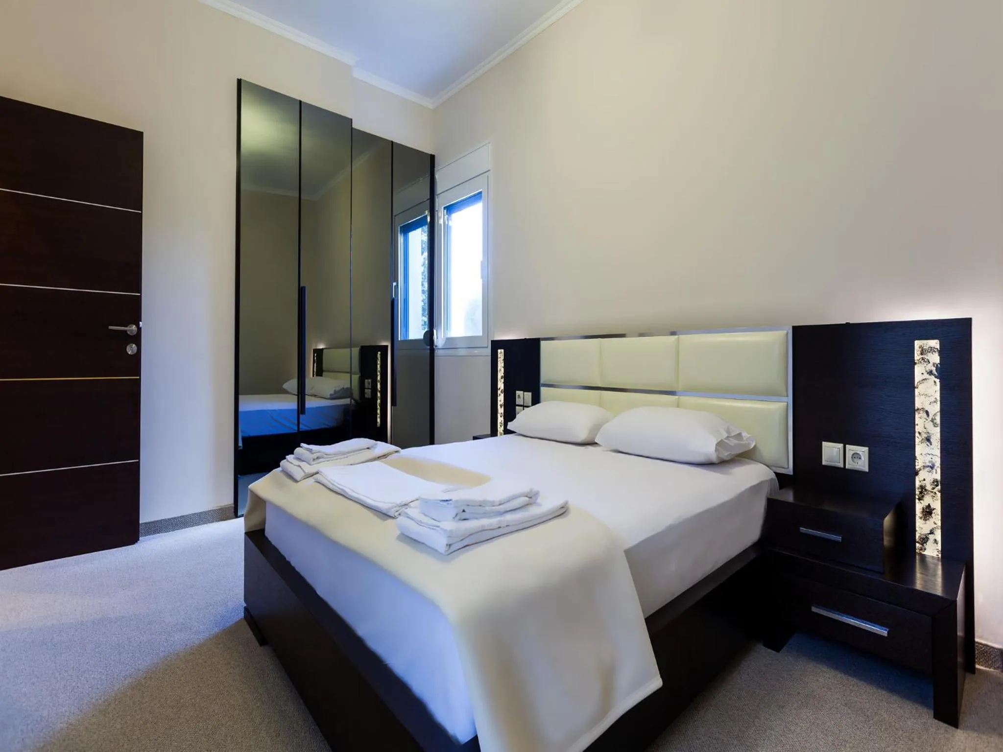 Bed in Pearl Bay Hotel Apartments