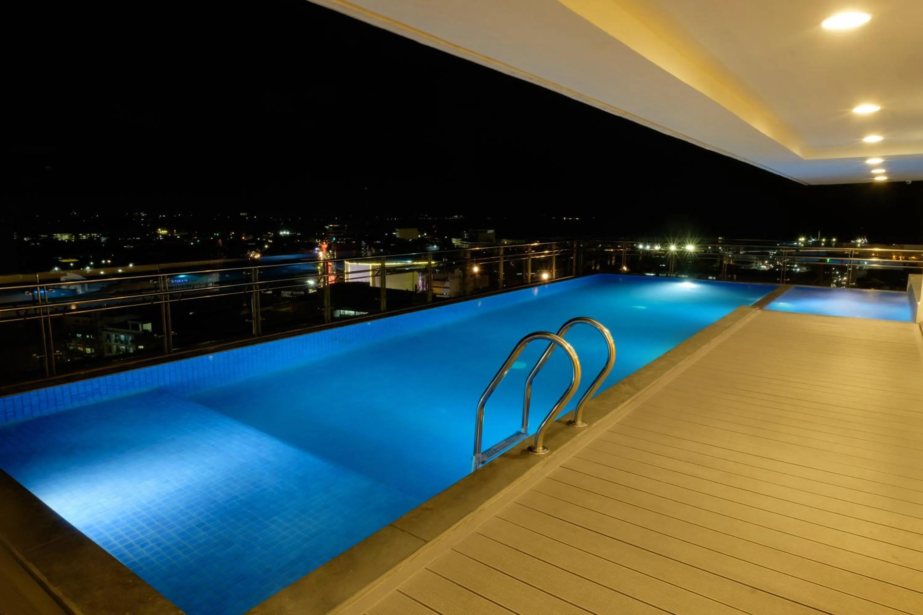 Swimming pool in One Central Hotel & Suites