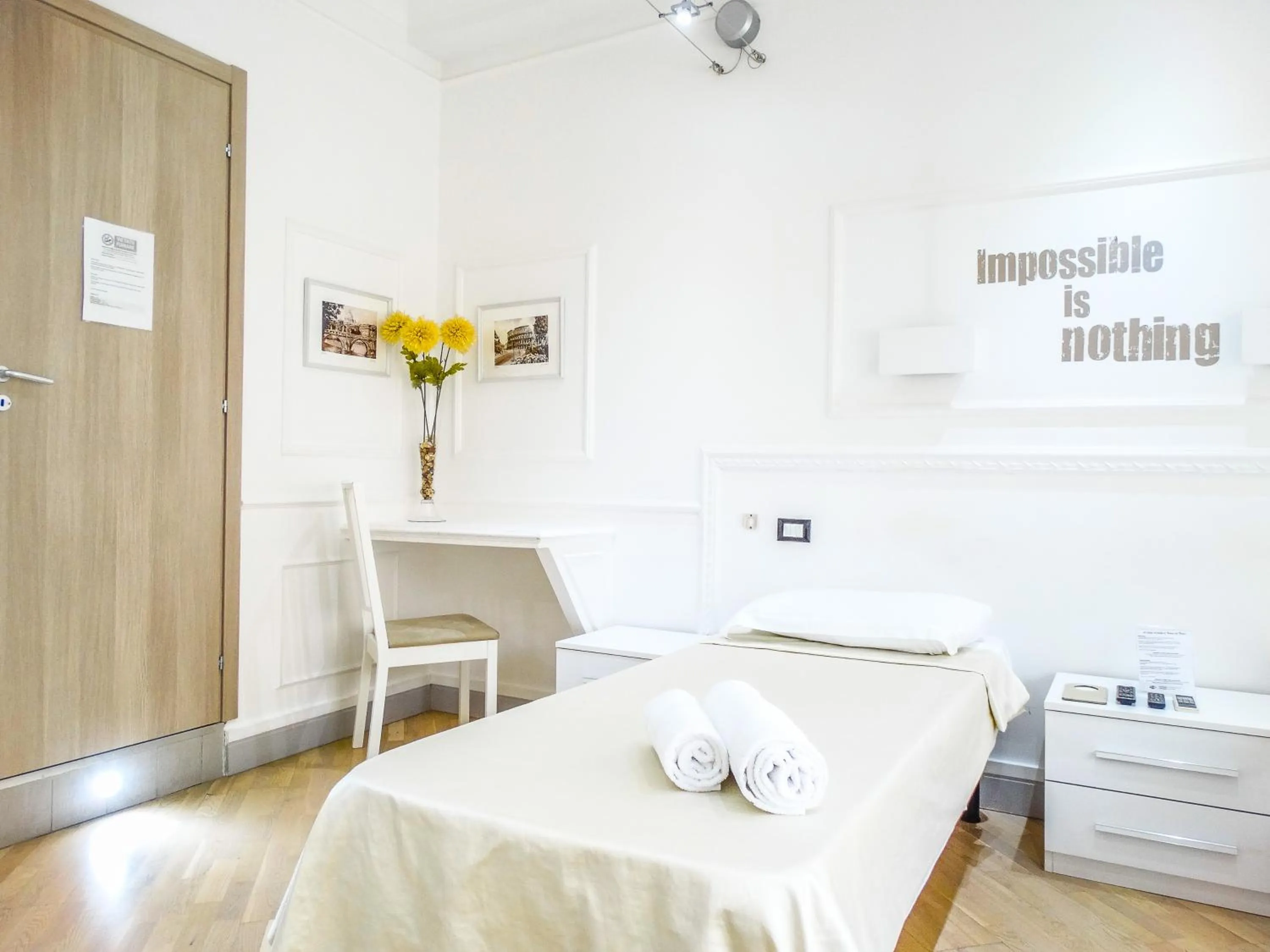 Photo of the whole room, Bed in Rome Central Inn