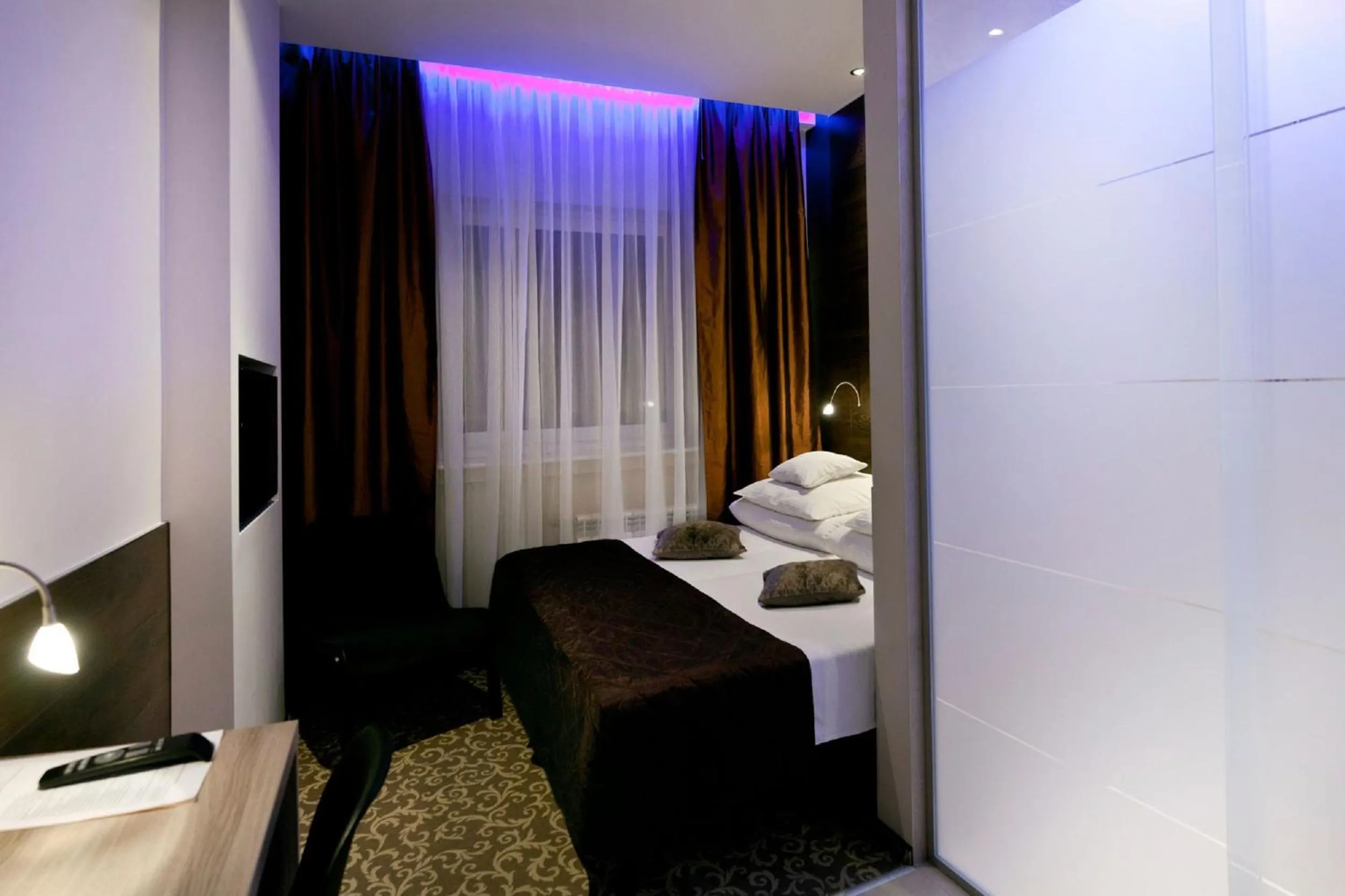 Photo of the whole room, Bed in Nu Hotel