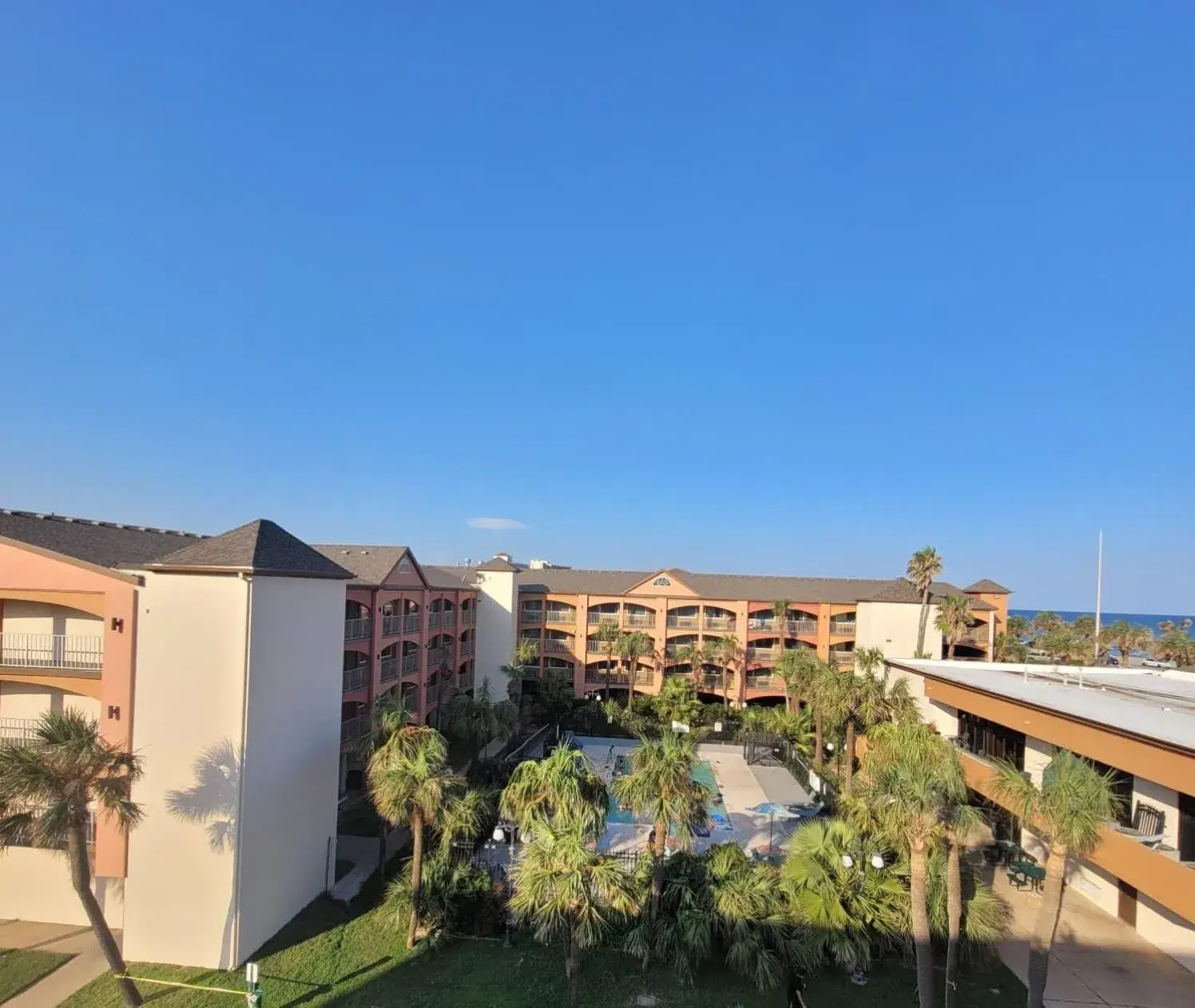 Pool view in Beachfront Palms Hotel Galveston Pool view in Beachfront Palms Hotel Galveston
