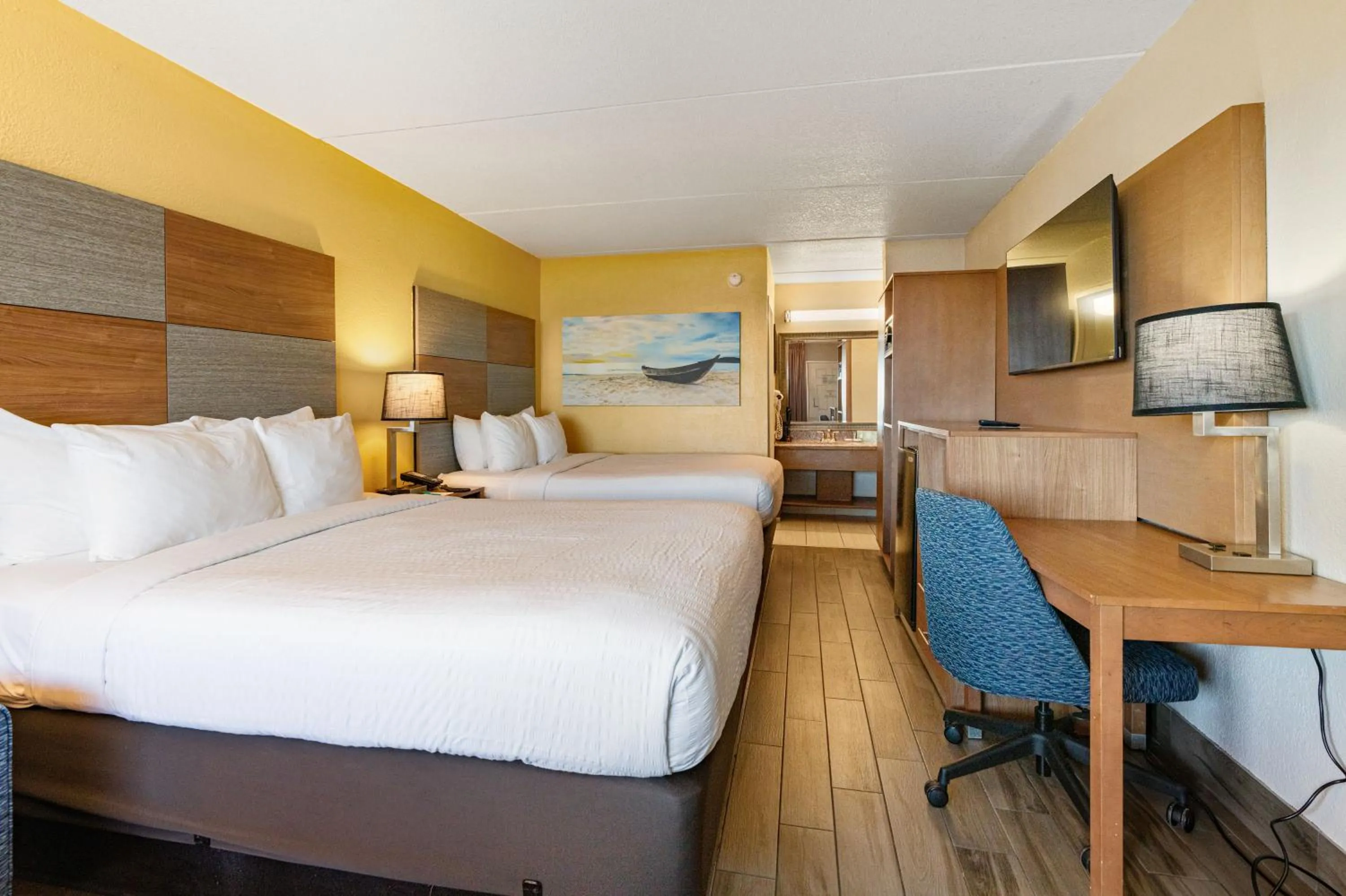 Bed in Clarion Pointe Galveston - Beachfront