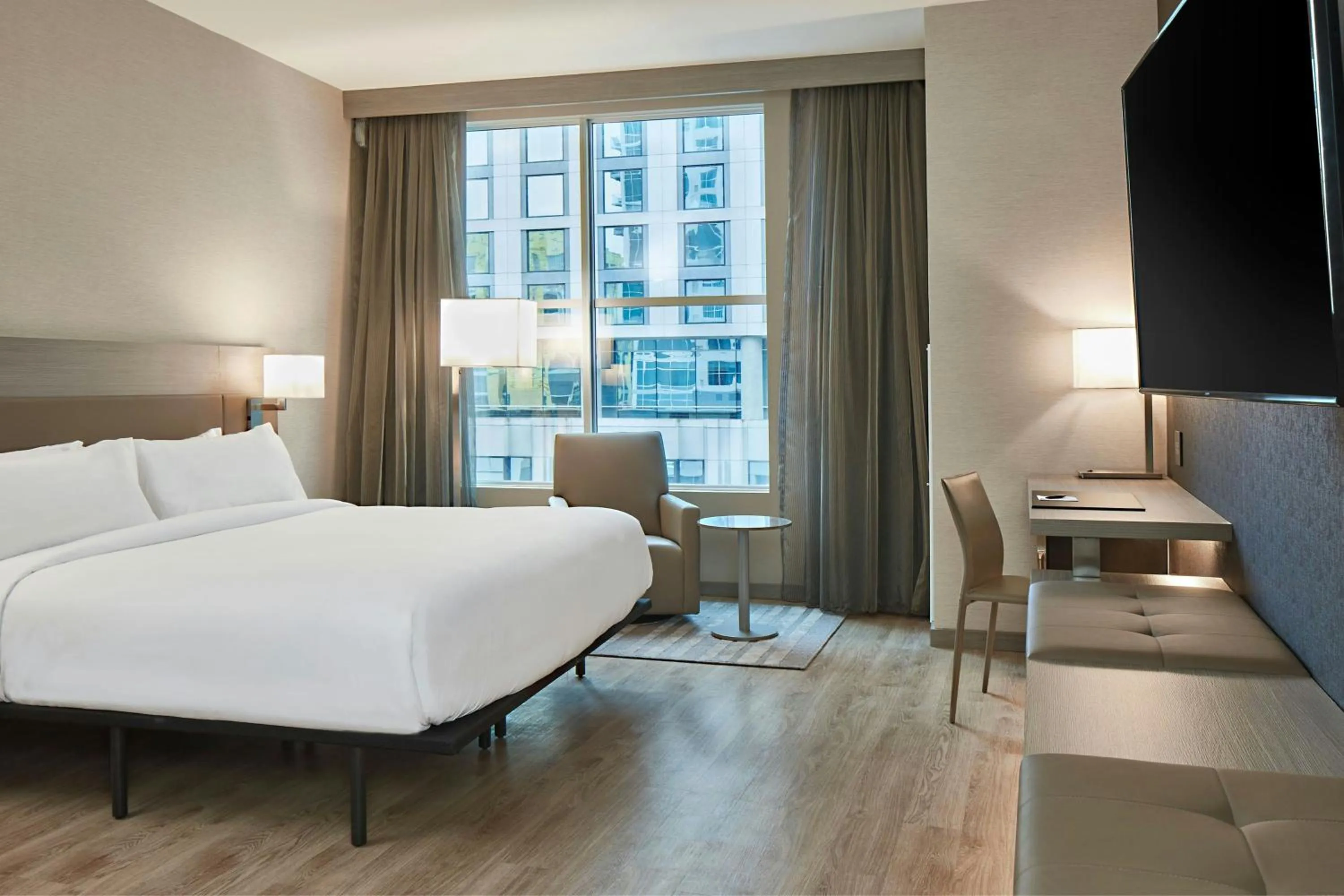 Photo of the whole room, Bed in AC Hotel Nashville Downtown