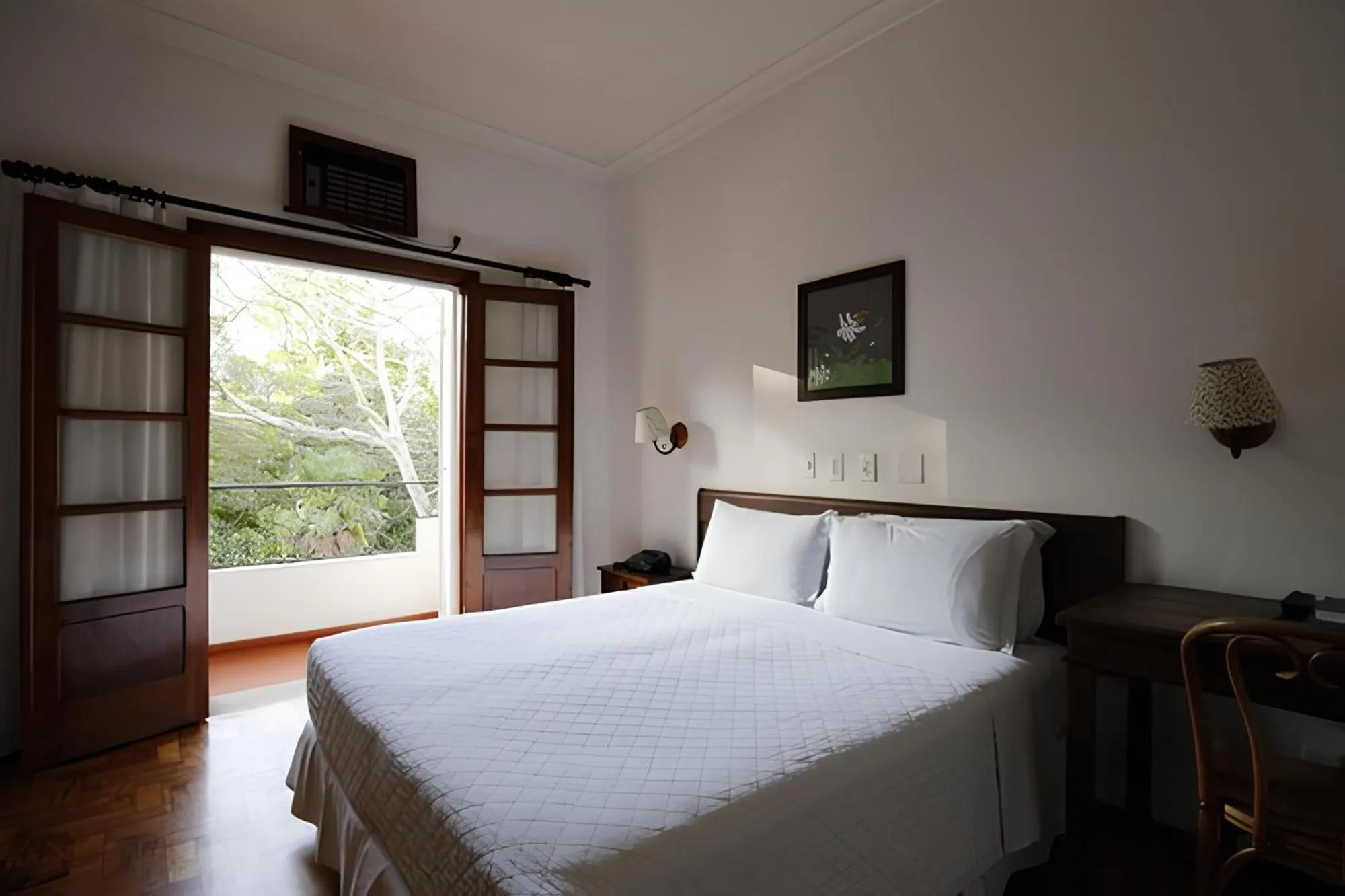 Bed in VOA Hotel União