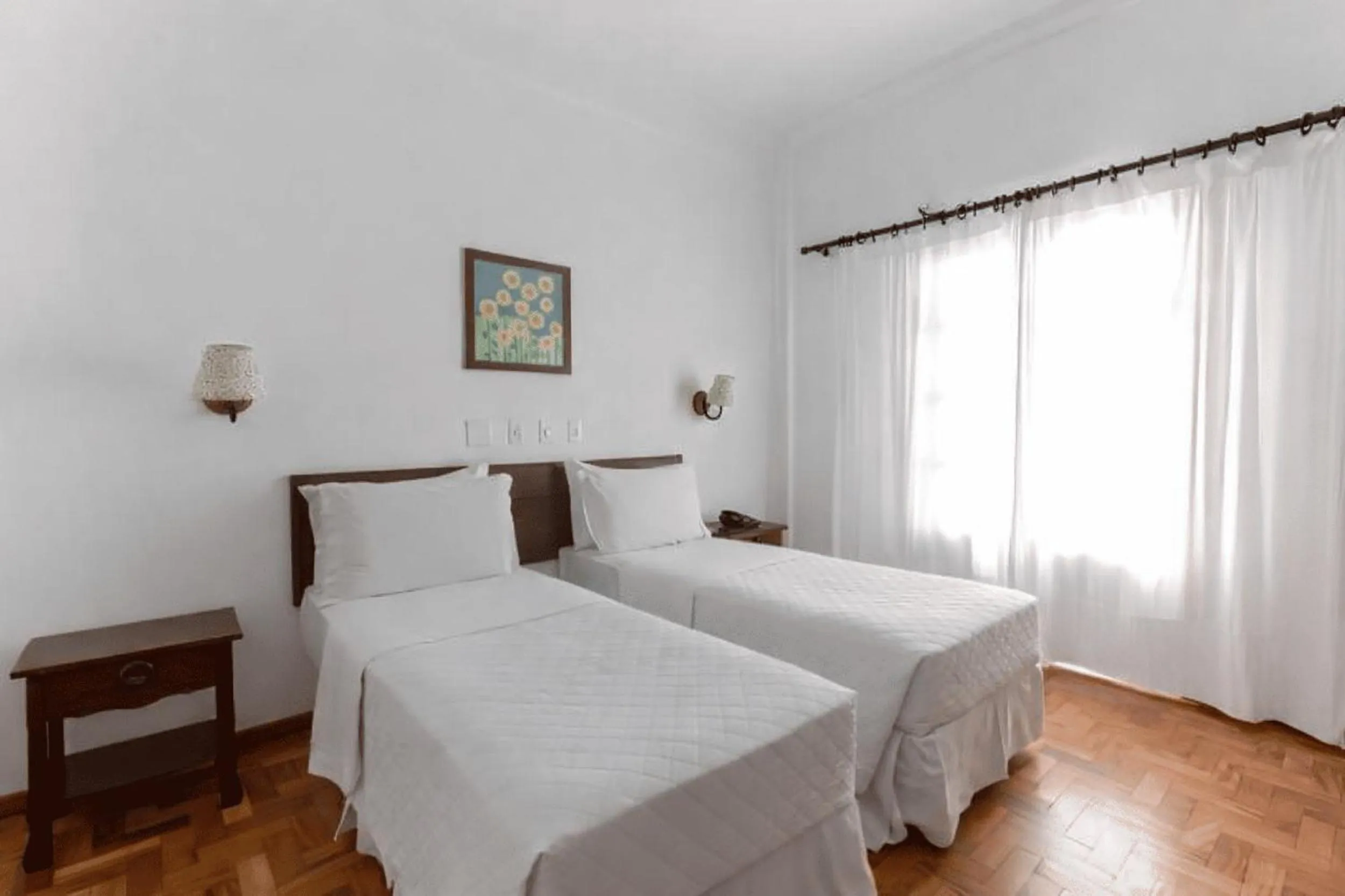 Bed in VOA Hotel União