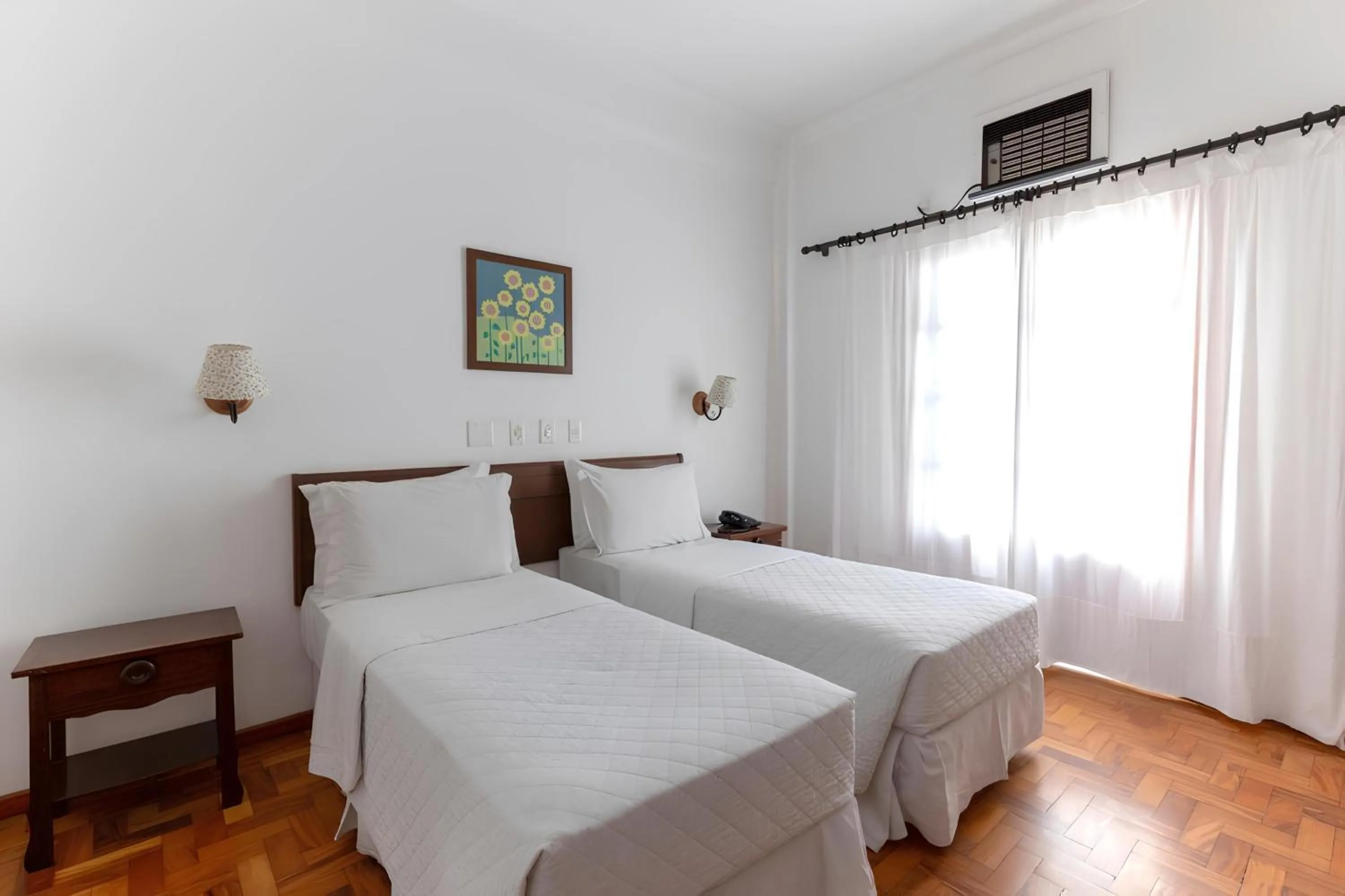 Bed in VOA Hotel União