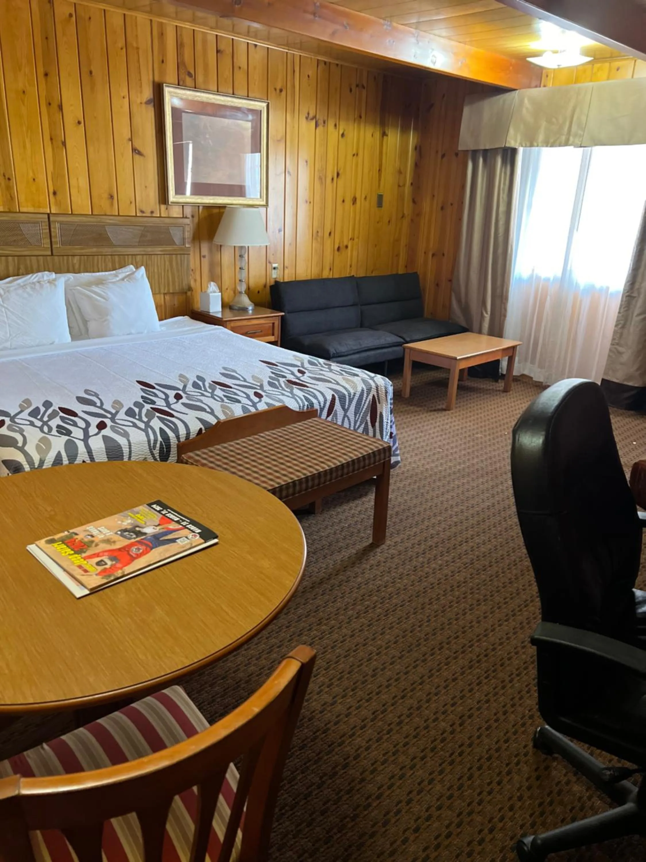 Bed in Prospector Motor Lodge