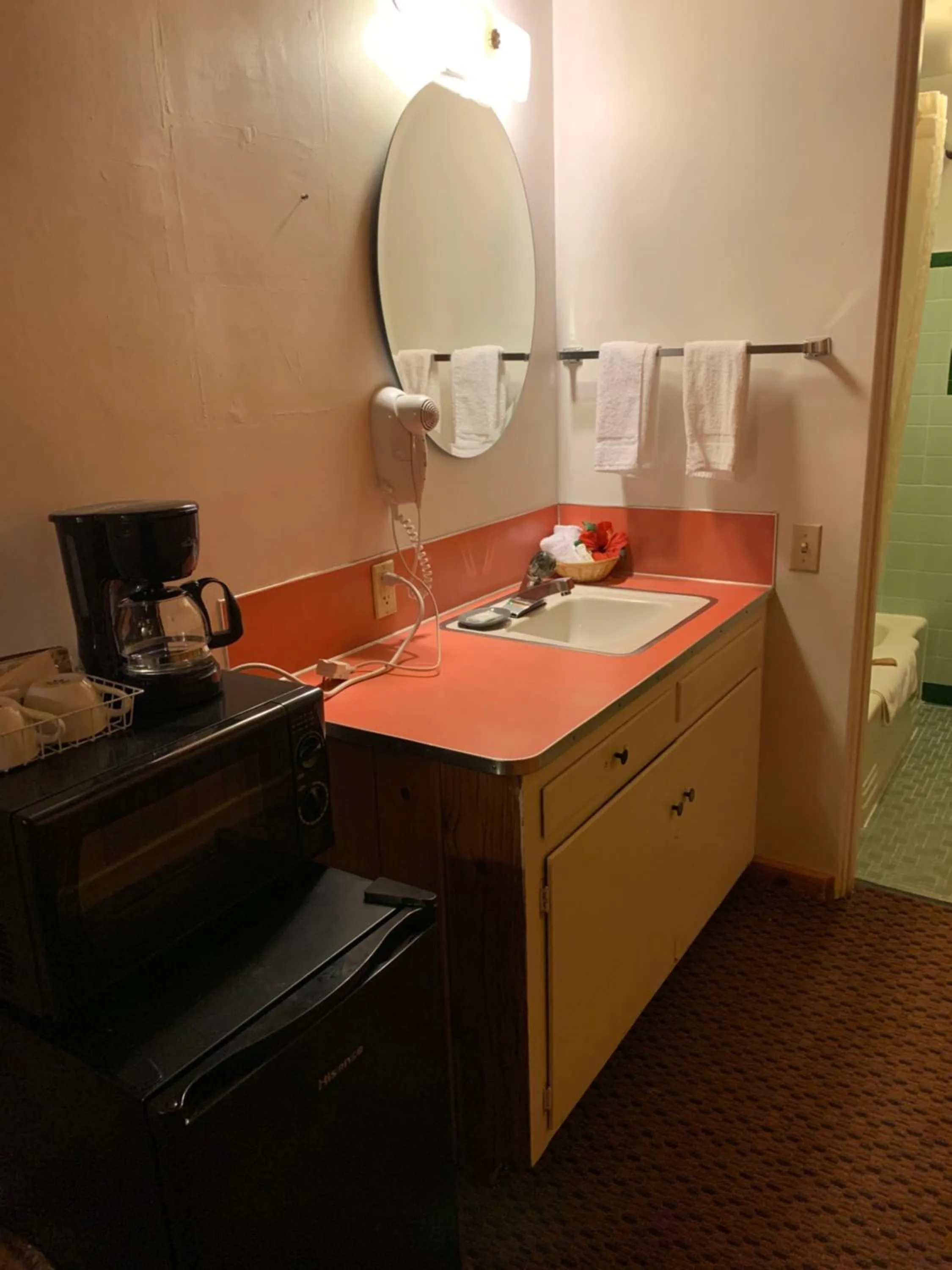 Bed in Prospector Motor Lodge