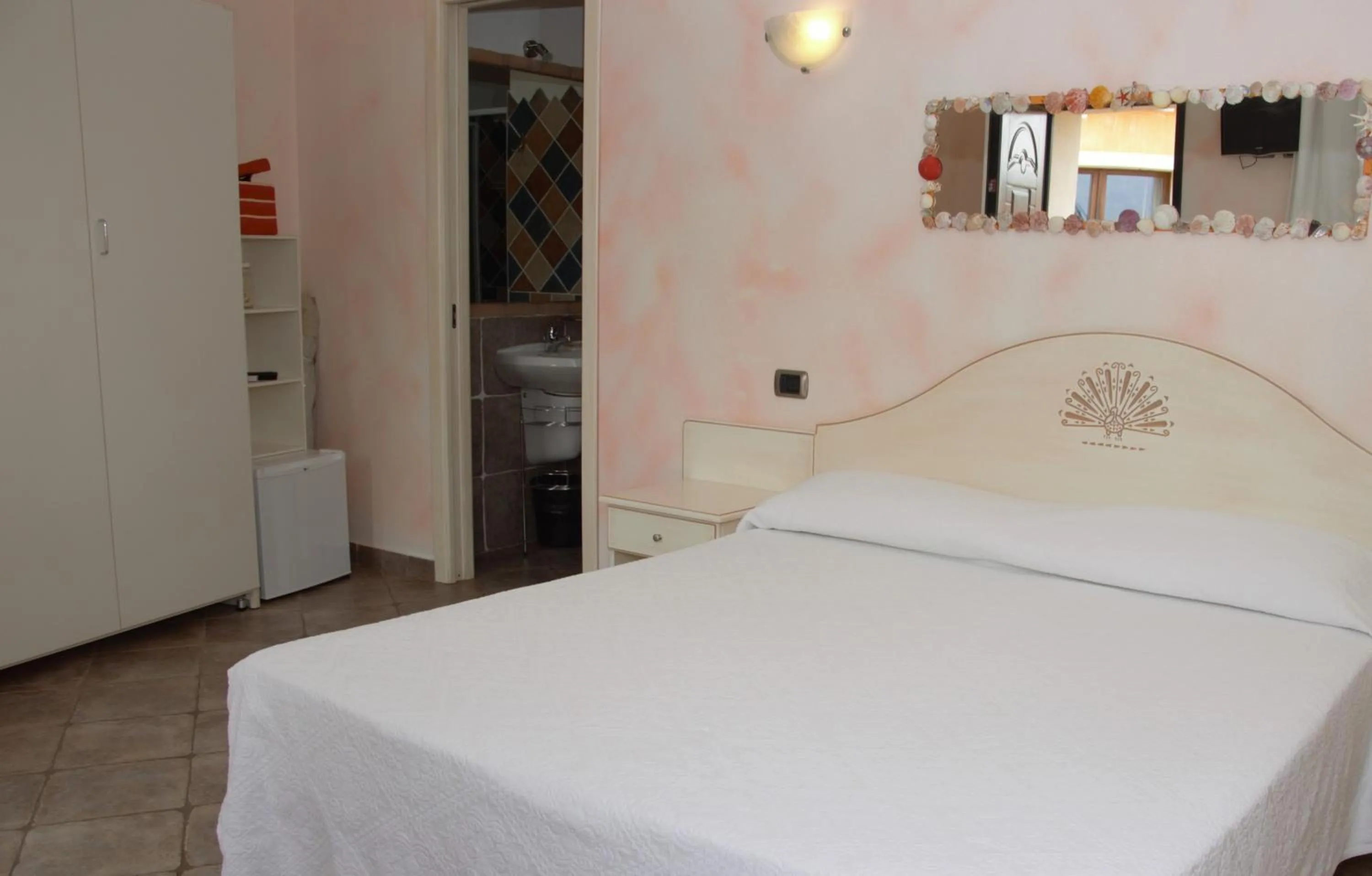 Photo of the whole room, Bed in Hotel Sa Cralla Villasimius