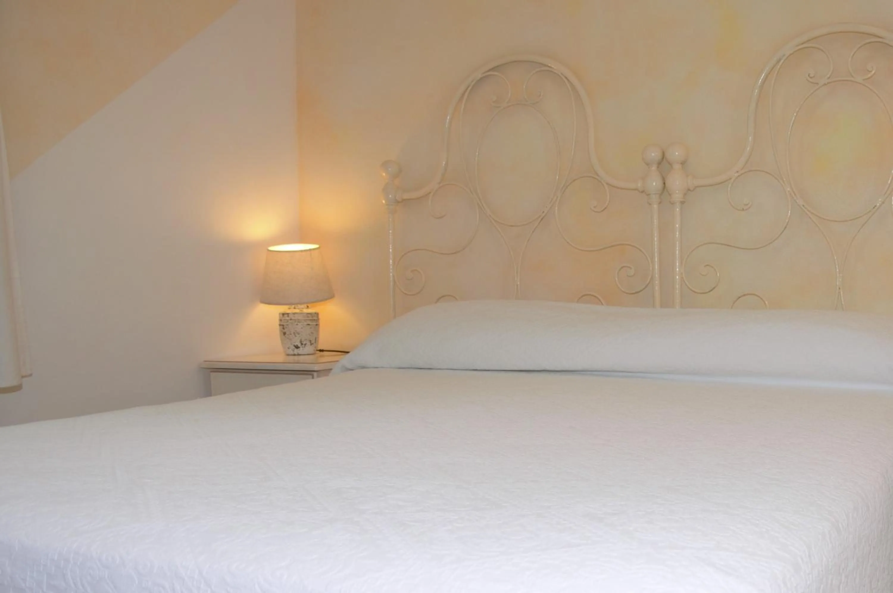 Bed in Hotel Sa Cralla Villasimius