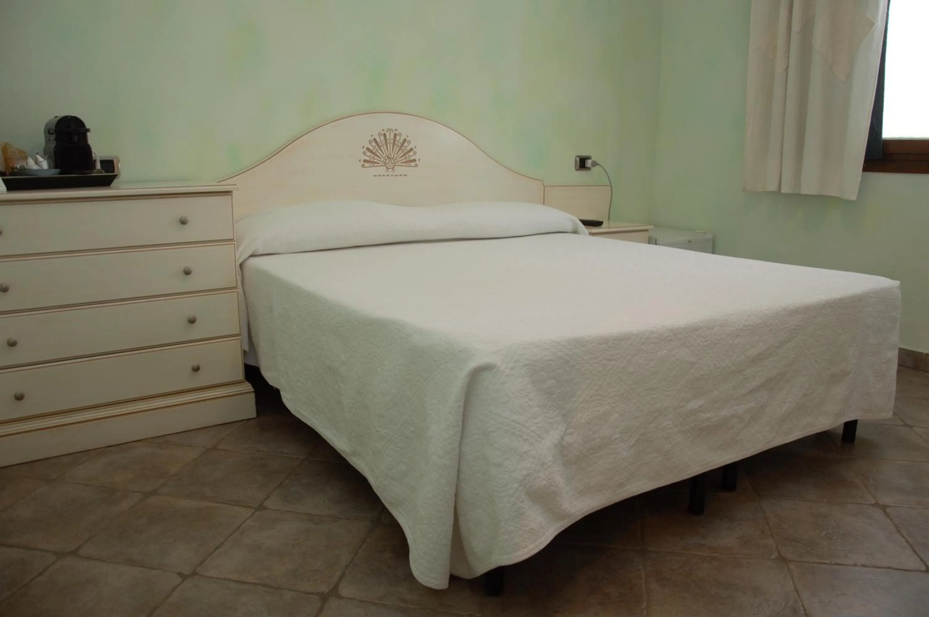 Bed in Hotel Sa Cralla Villasimius