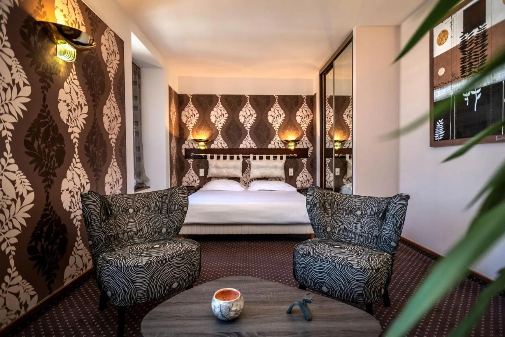 Seating area, Bed in Logis Hôtel Restaurant Gilles Moreau Laguiole