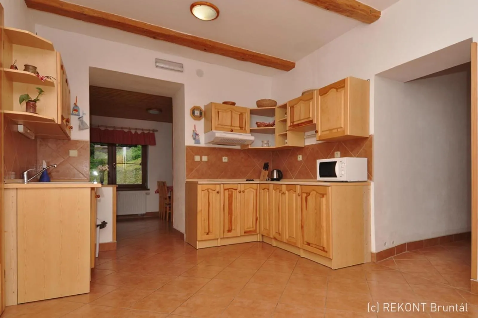 Kitchen or kitchenette in Penzion u Vodopádu