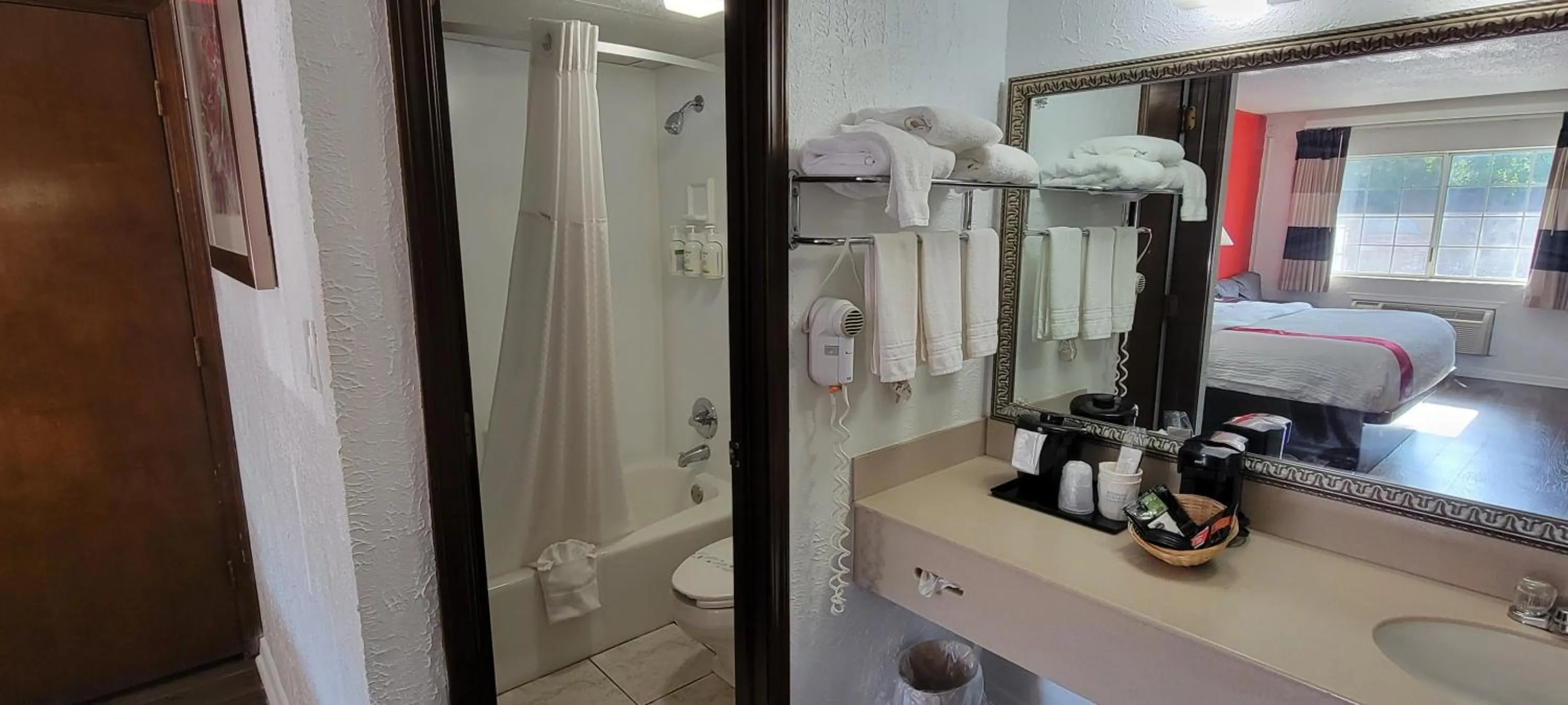 Toilet, Bed in Ramada by Wyndham Mountain Home