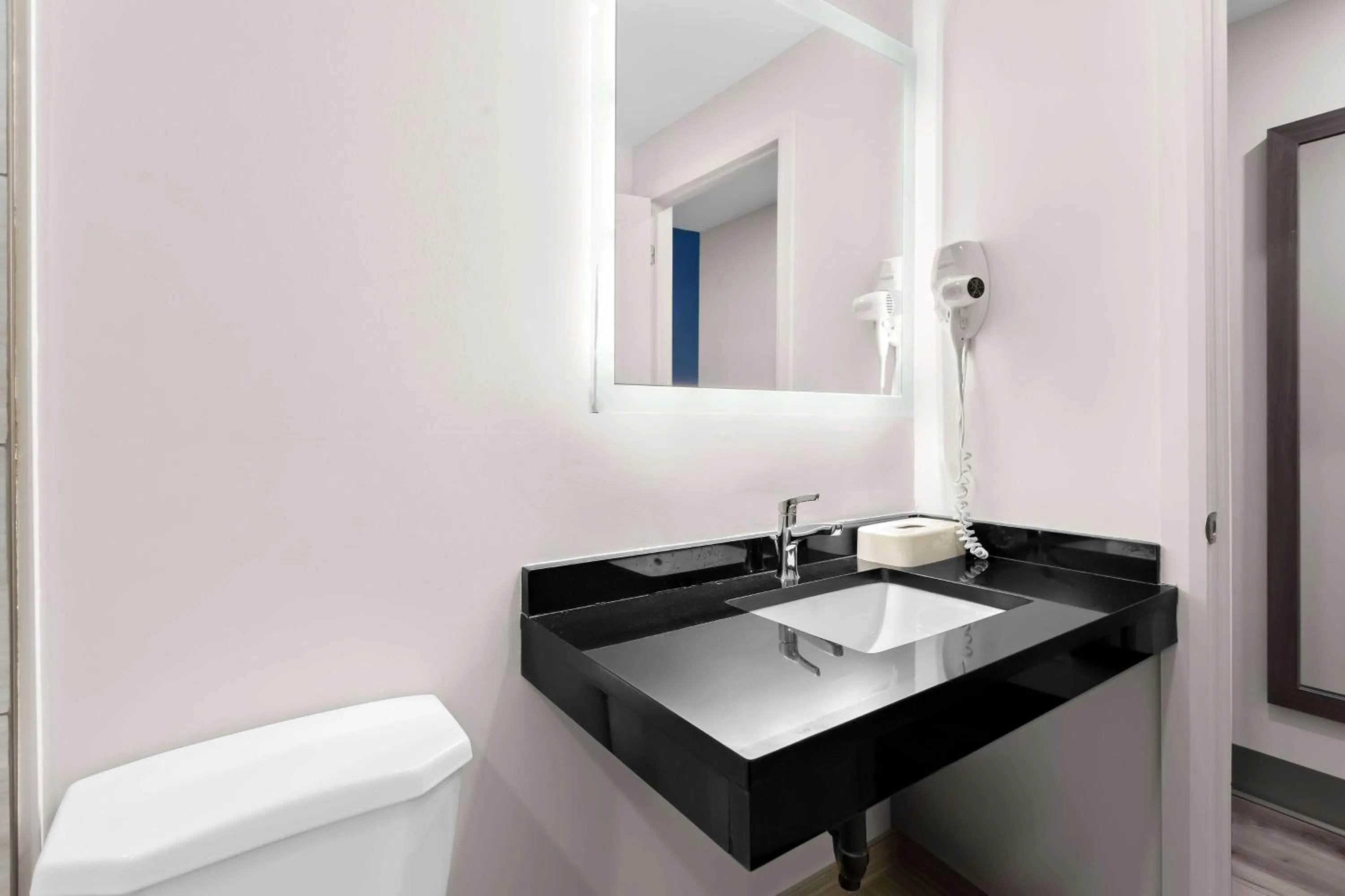 Bathroom in SureStay Plus by Best Western Windsor