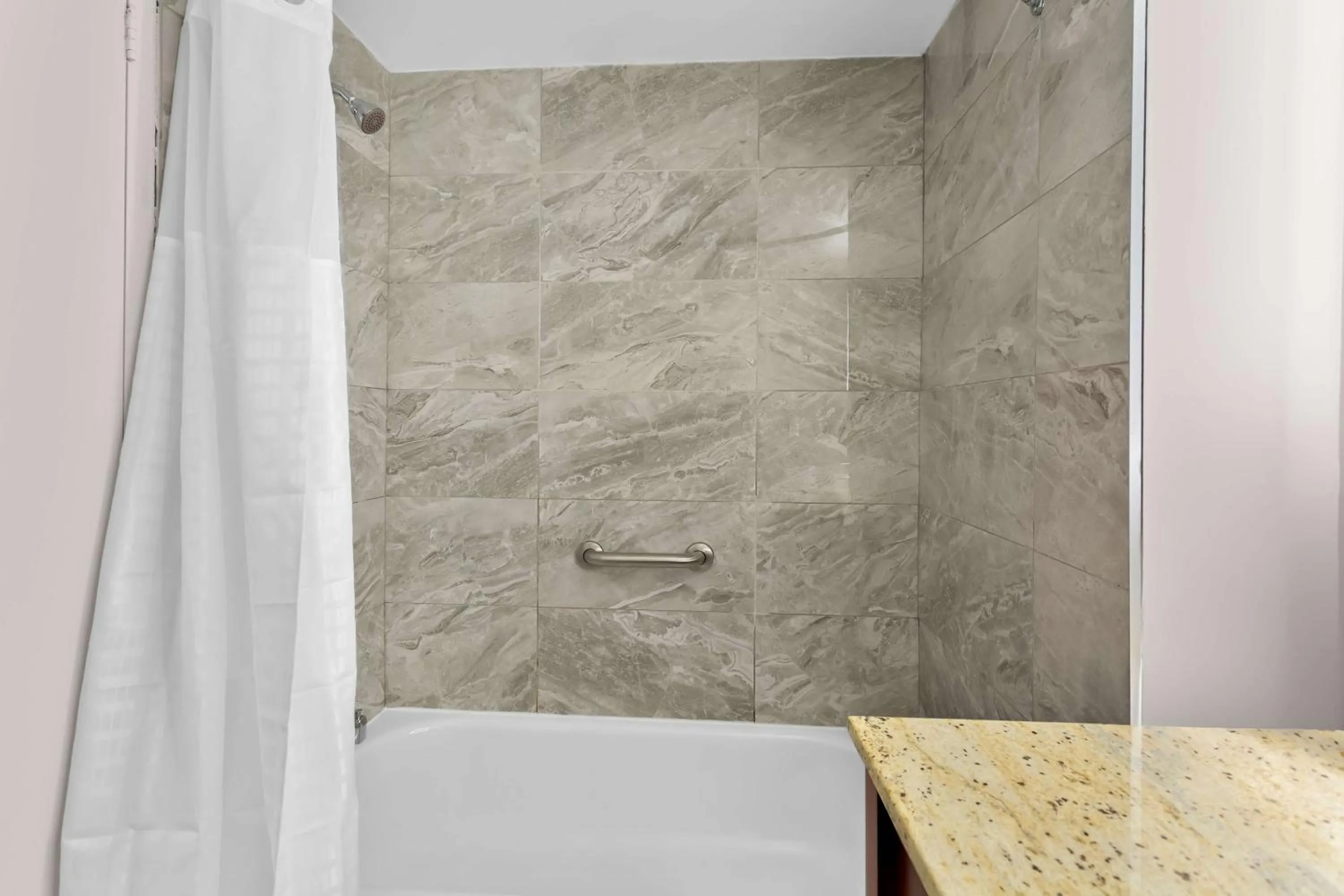 Bathroom in SureStay Plus by Best Western Windsor