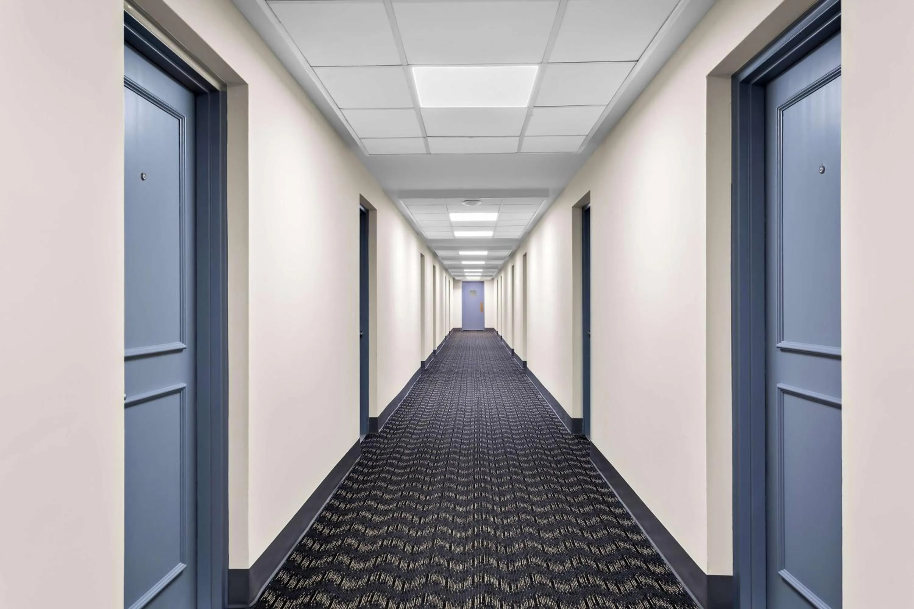 Property building in SureStay Plus by Best Western Windsor