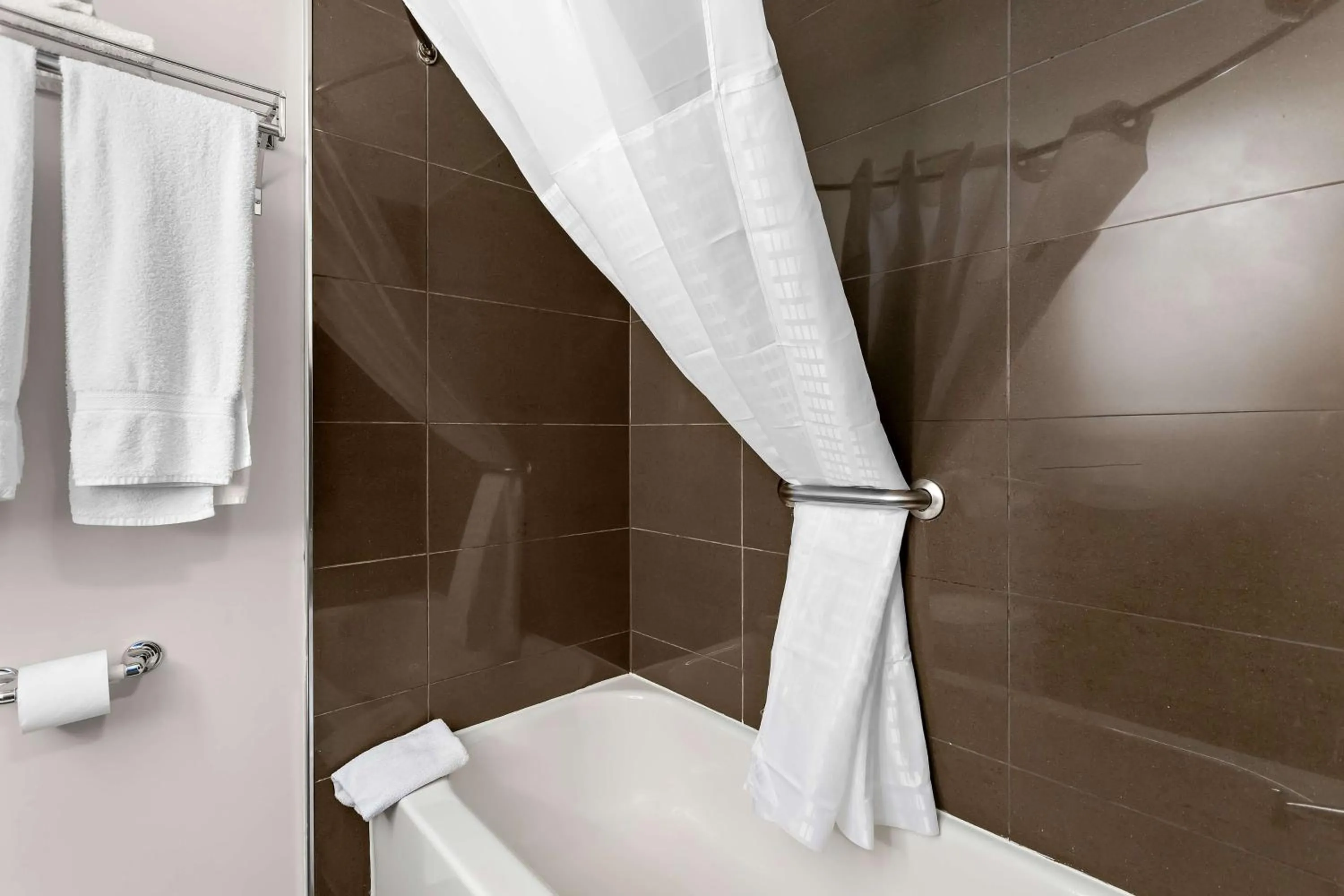 Bathroom in SureStay Plus by Best Western Windsor