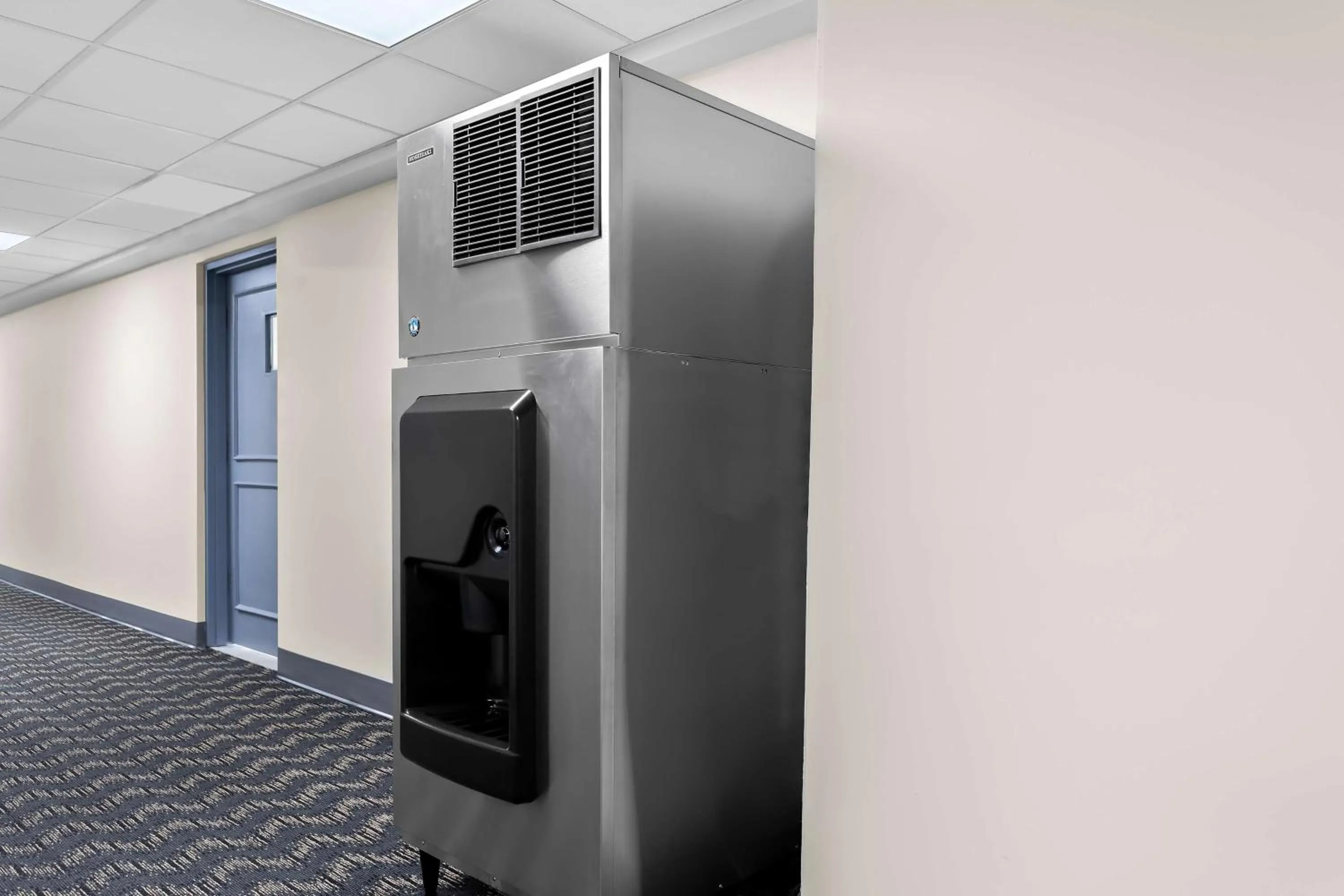 Property building in SureStay Plus by Best Western Windsor