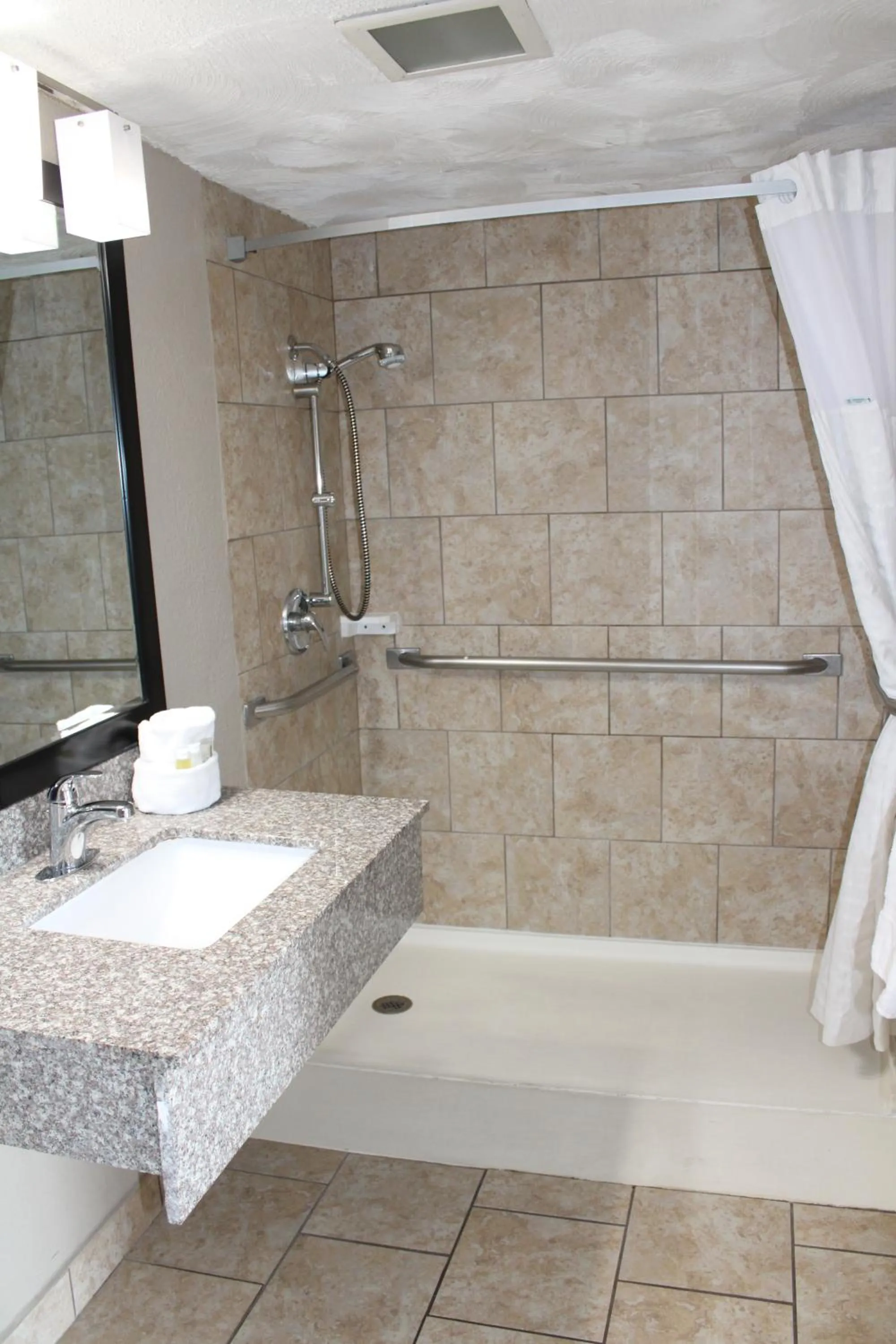 Shower in Days Inn & Suites by Wyndham Springfield on I-44