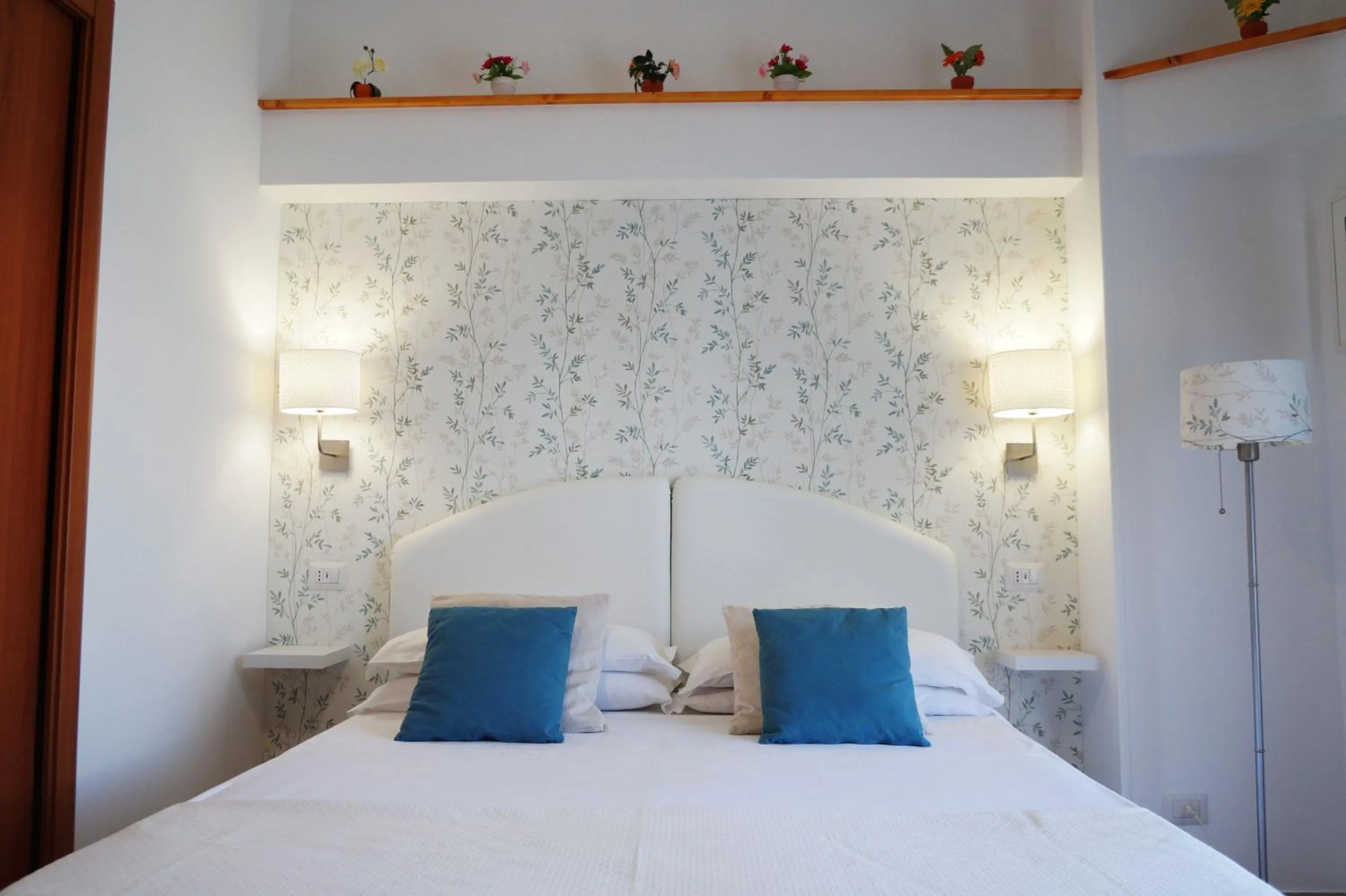 Bed in Villa Susy Relais