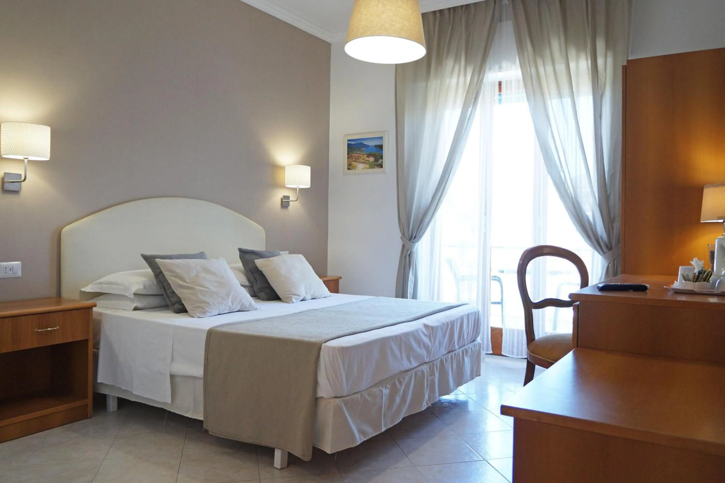 Bed in Villa Susy Relais