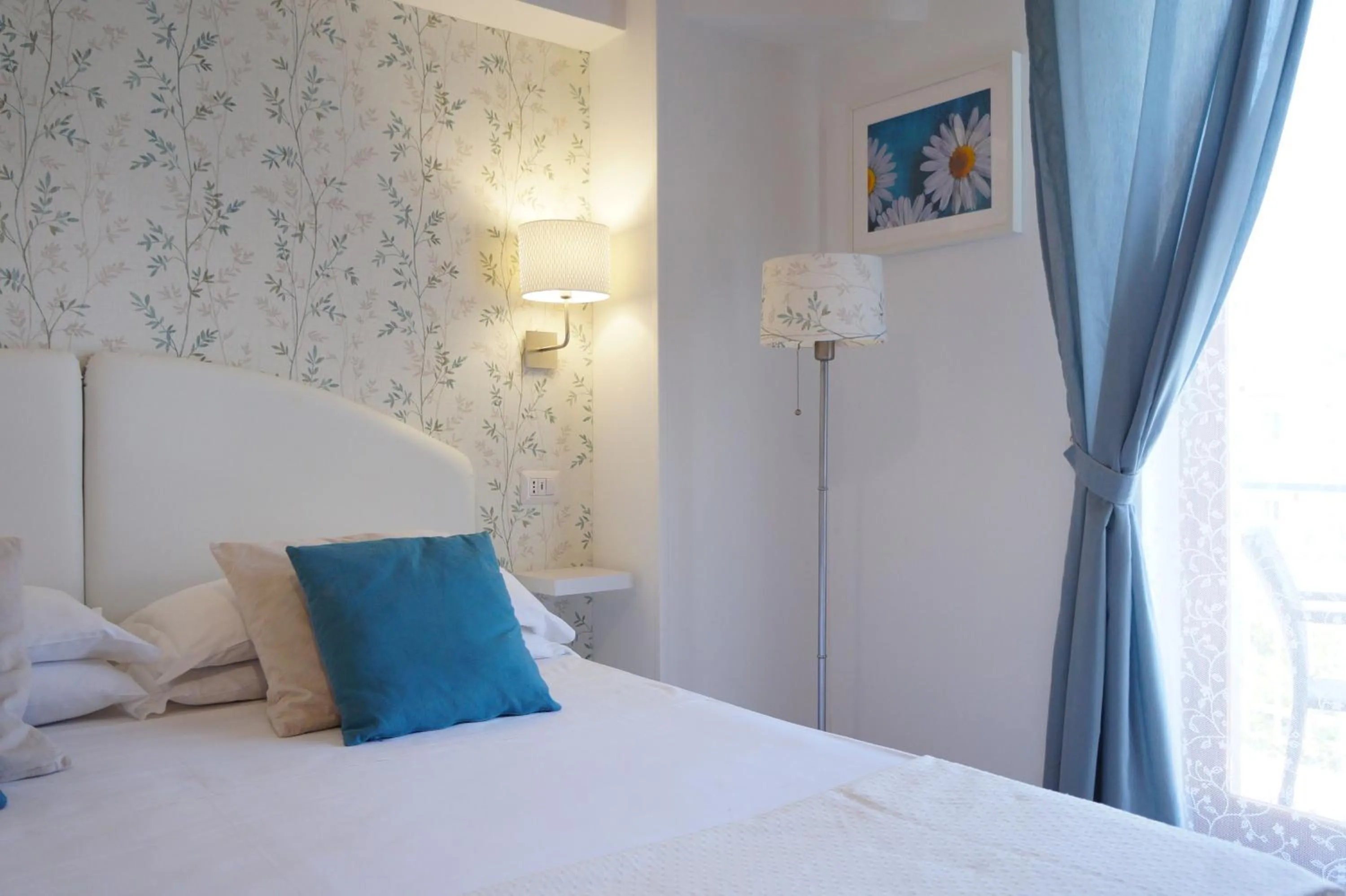 Bed in Villa Susy Relais