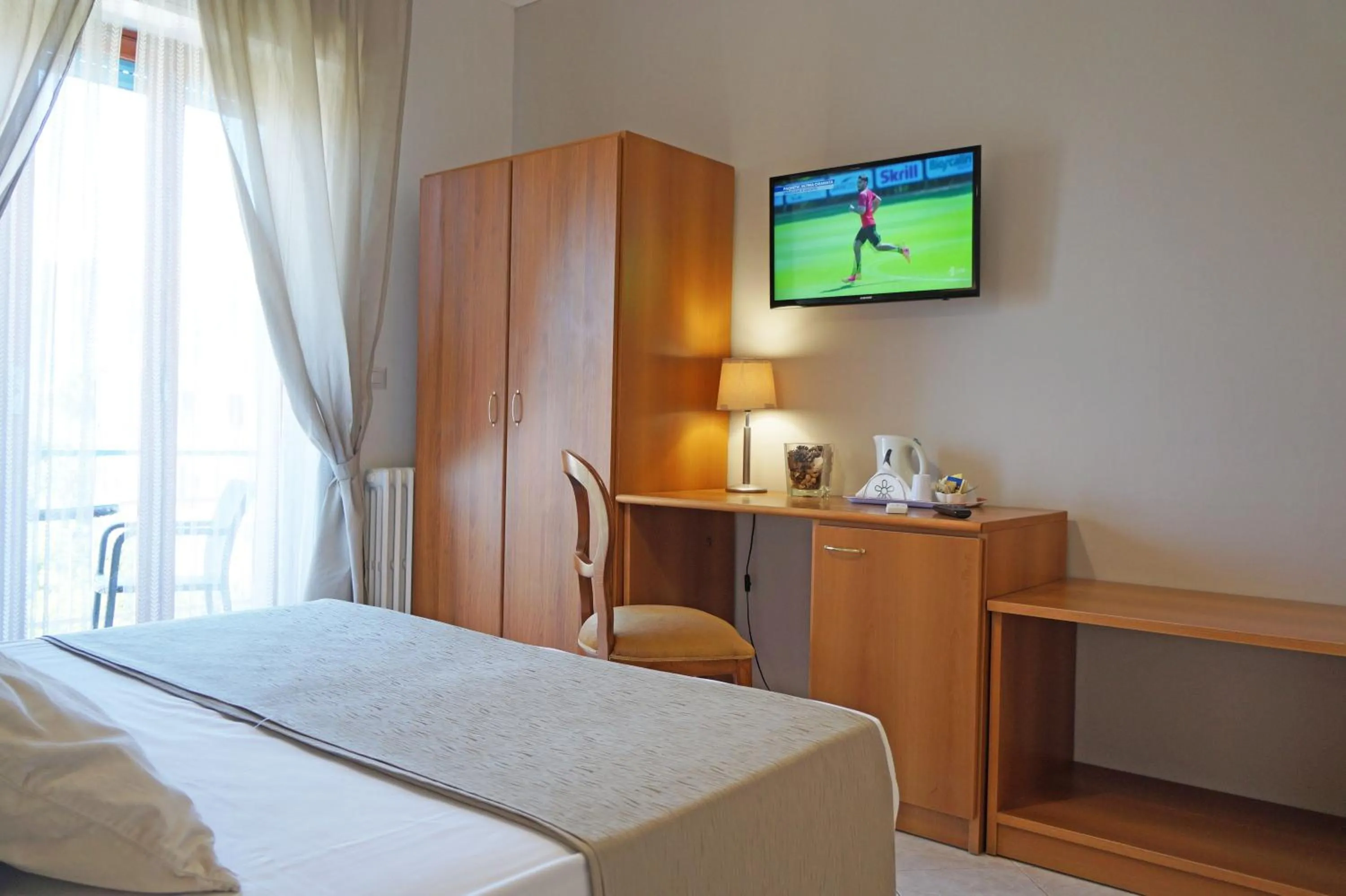 Bed in Villa Susy Relais