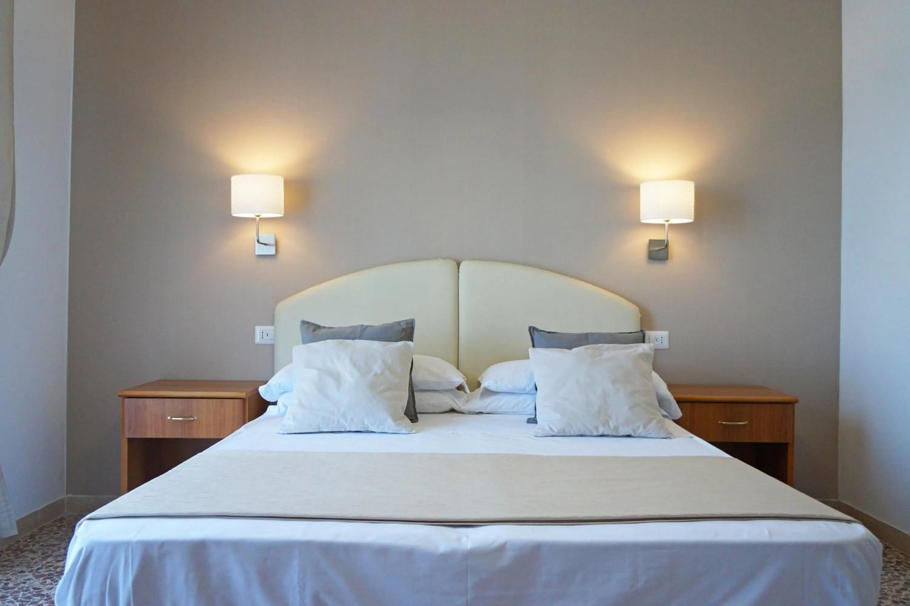 Bed in Villa Susy Relais