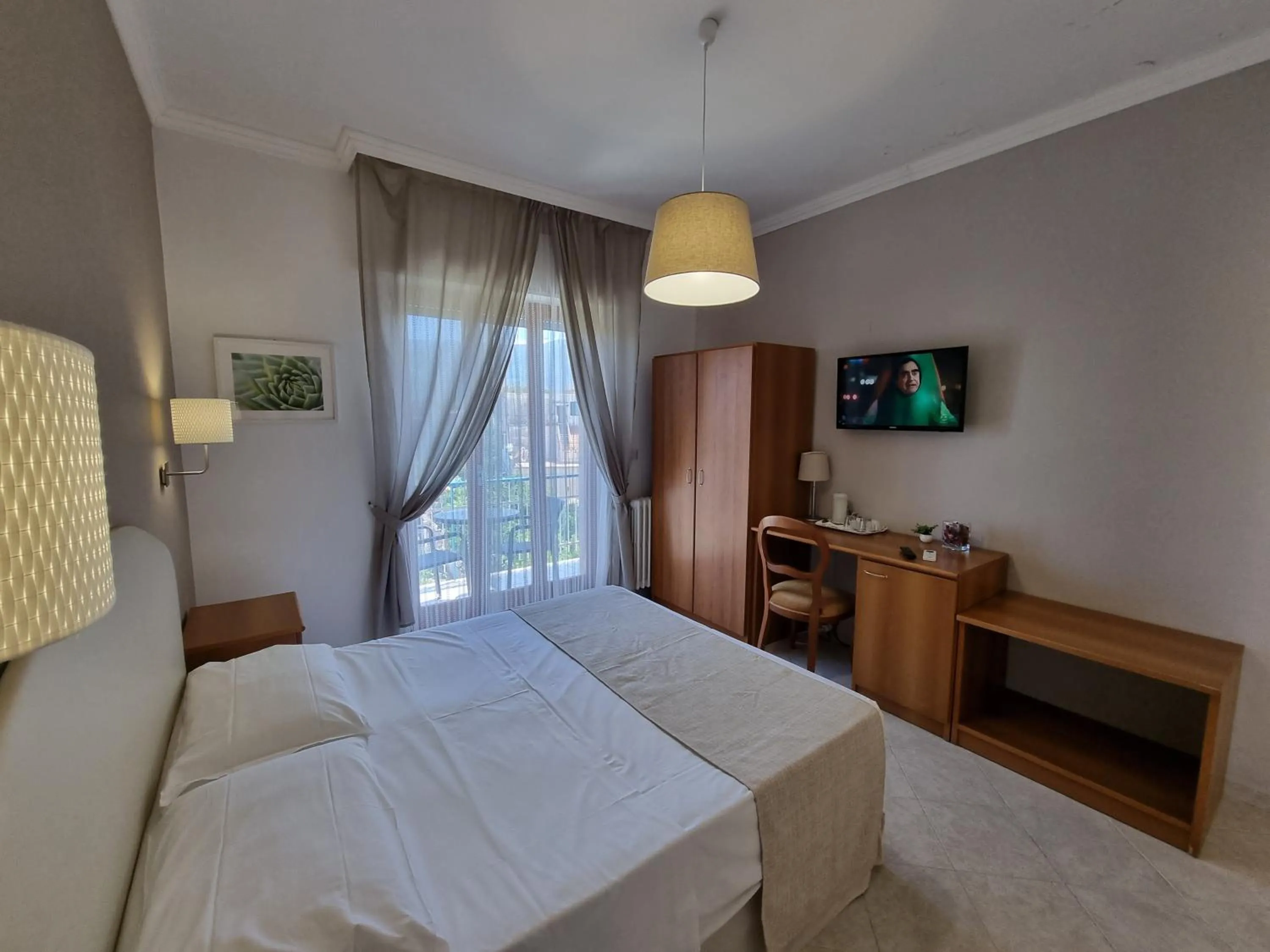 Bed in Villa Susy Relais