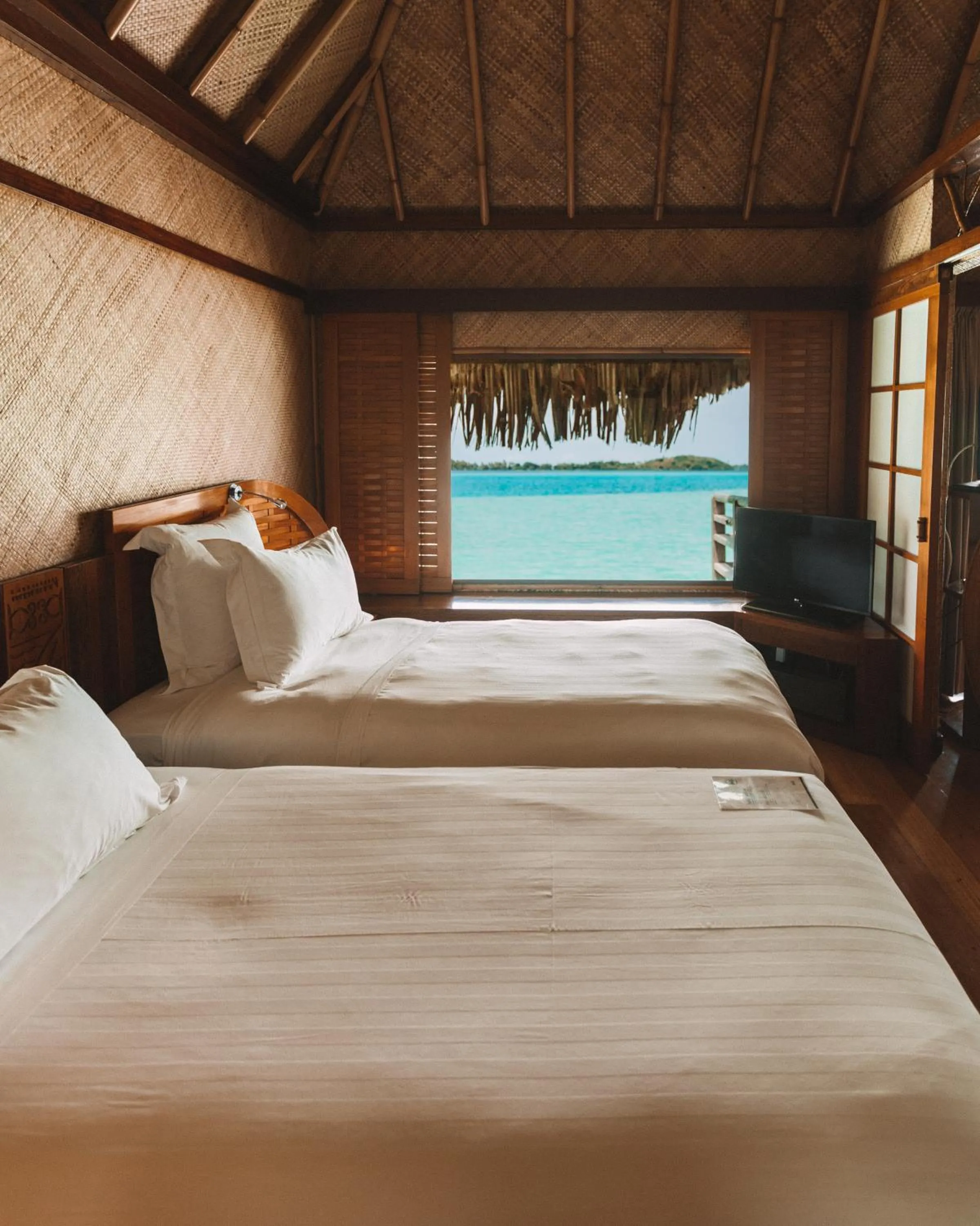 View (from property/room), Bed in InterContinental Bora Bora Le Moana Resort by IHG