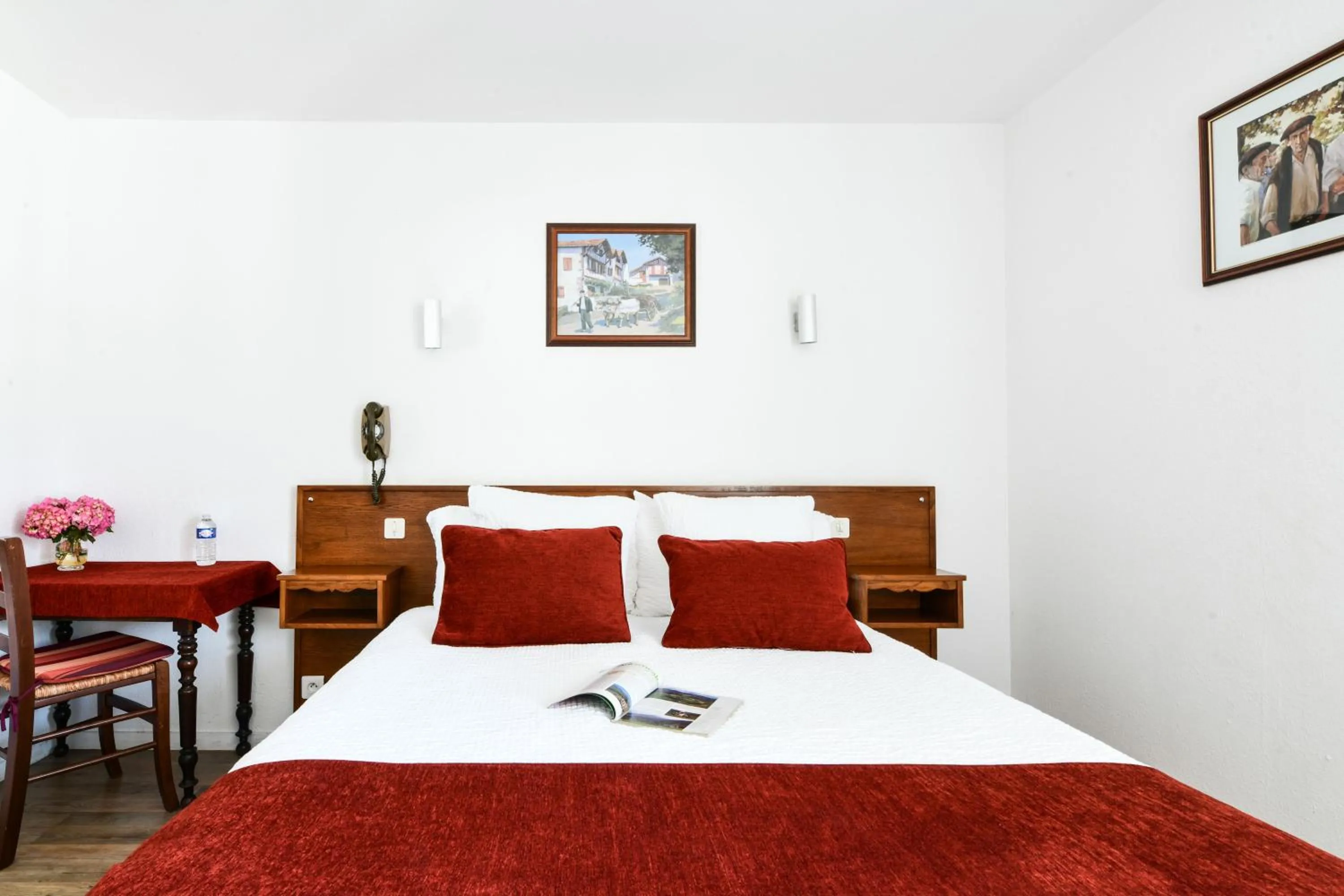 Bed in Logis Hôtel Baratxartea