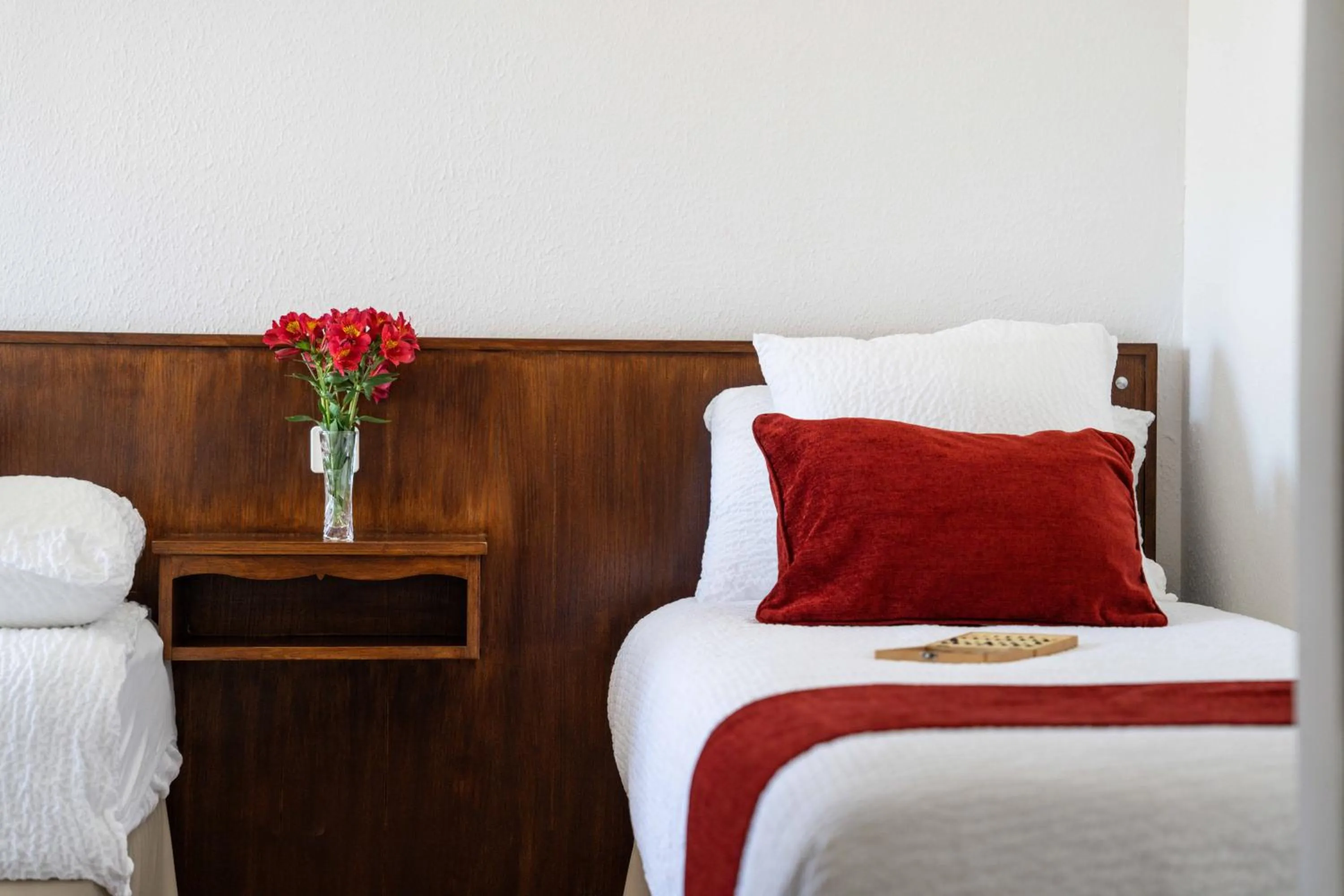 Bed in Logis Hôtel Baratxartea