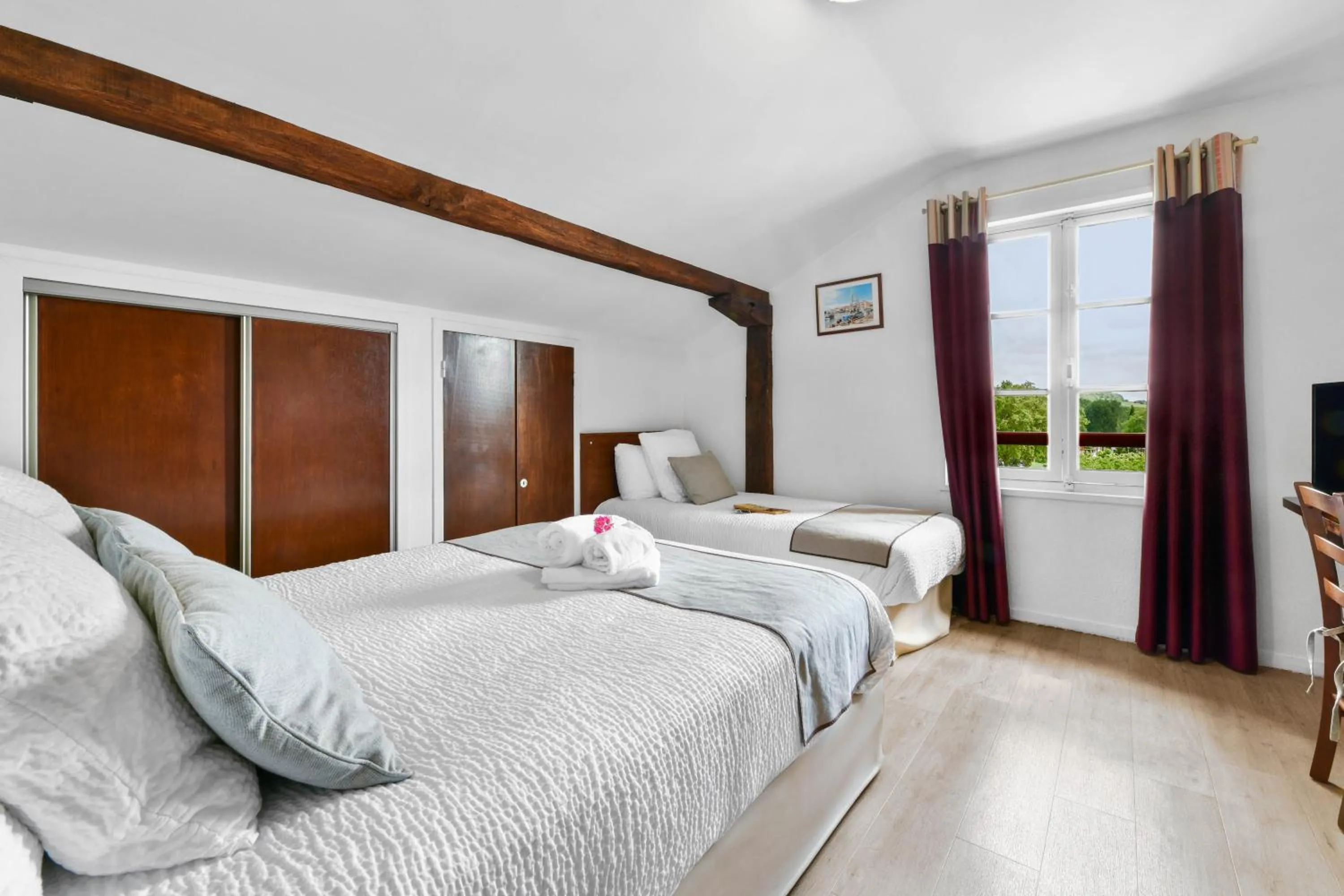 Bed in Logis Hôtel Baratxartea