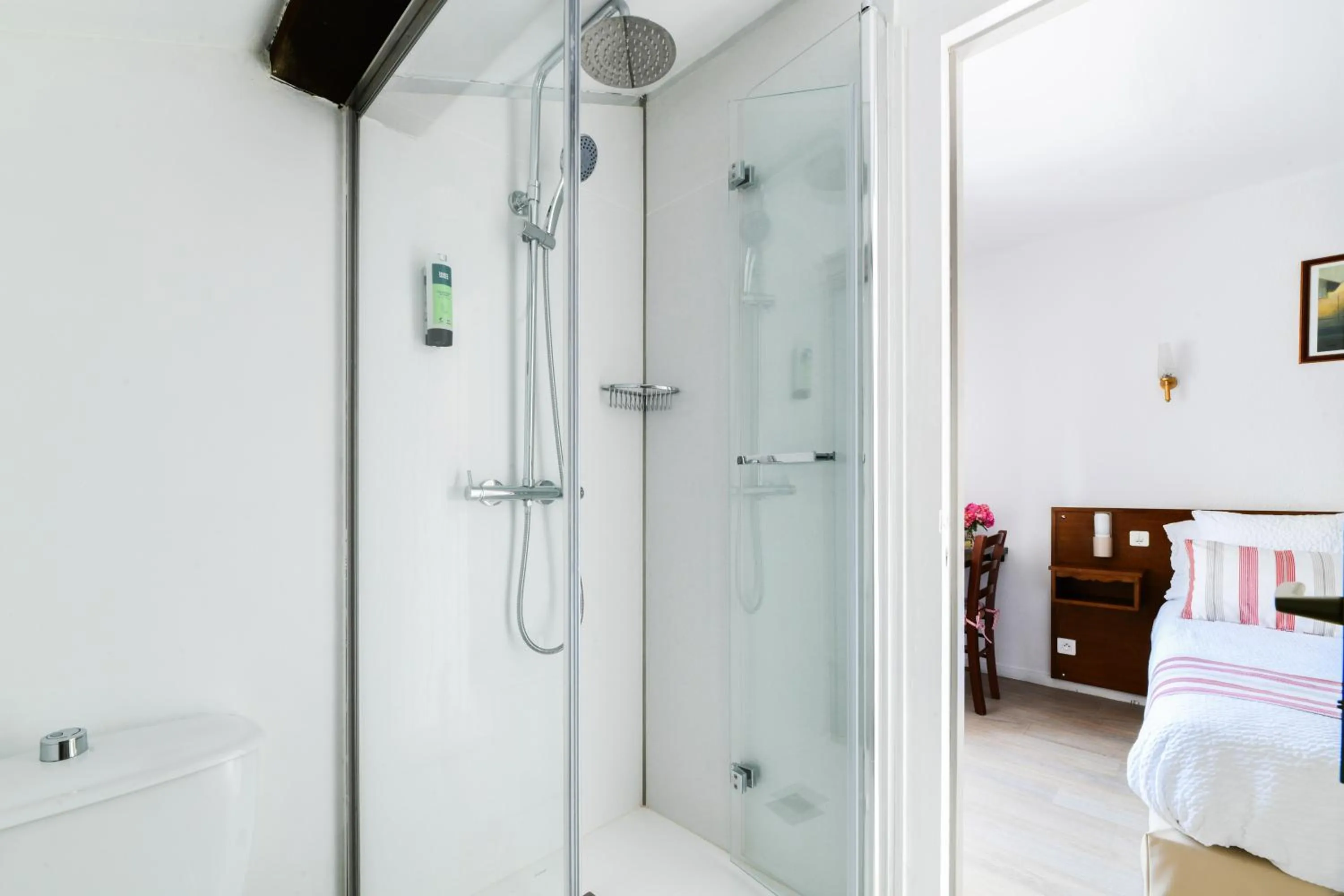 Bed in Logis Hôtel Baratxartea