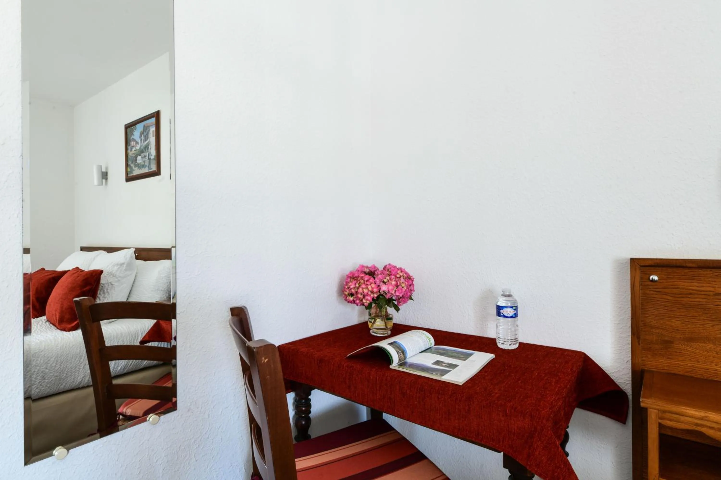 Bed in Logis Hôtel Baratxartea