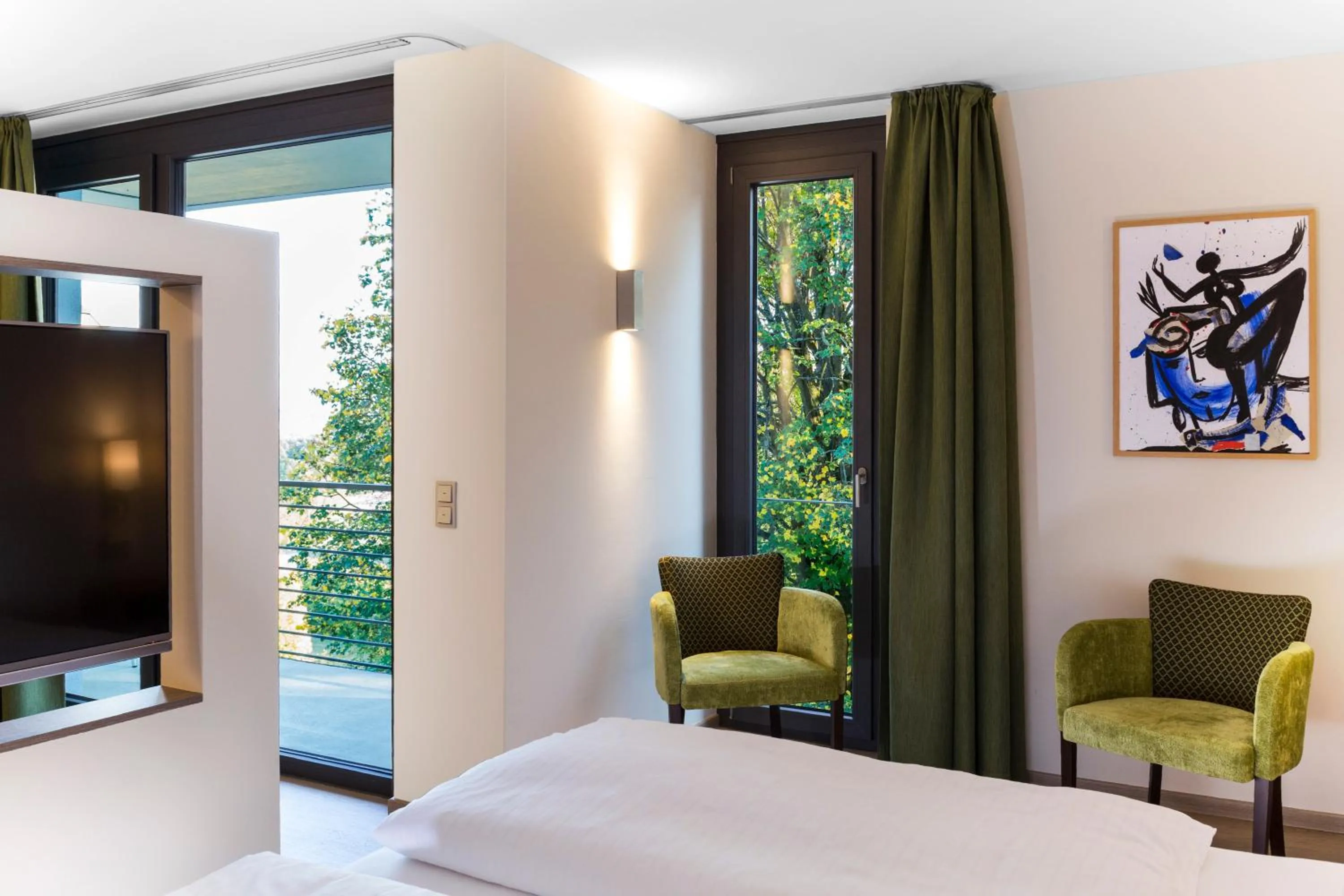 Photo of the whole room, Bed in SeminarZentrum Rückersbach