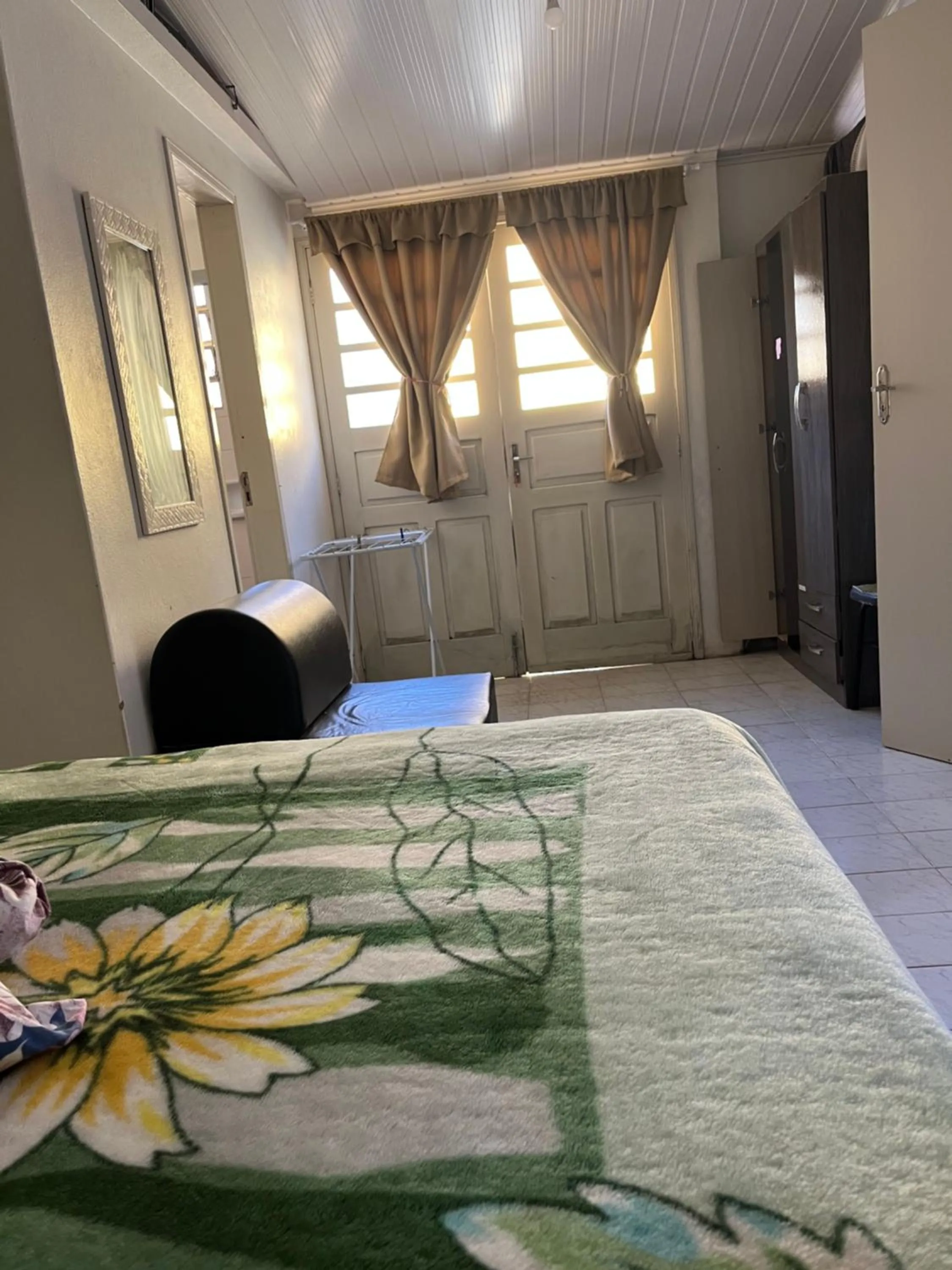 Bed in Apartamento kitchenette
