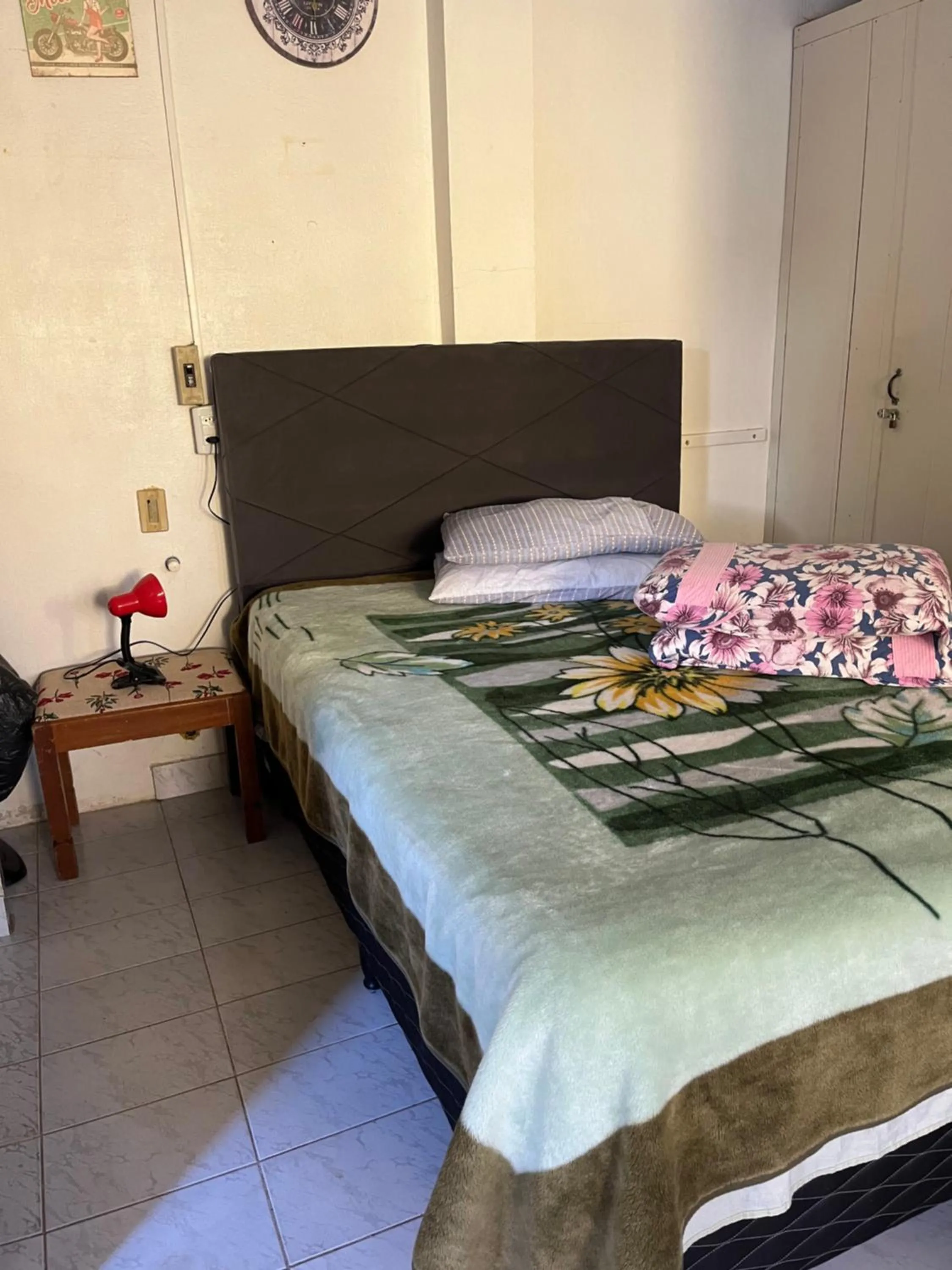 Bed in Apartamento kitchenette