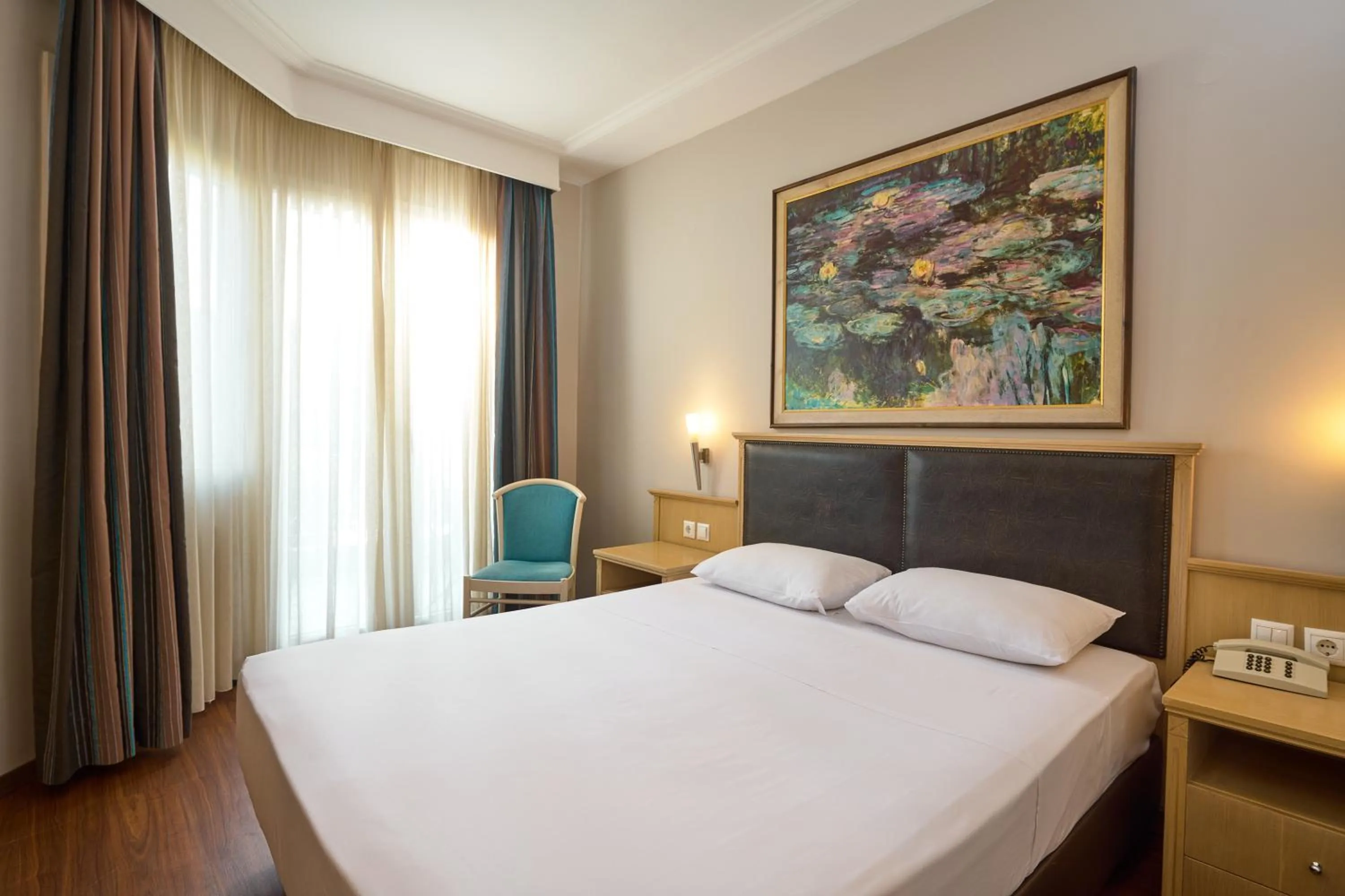 Photo of the whole room, Bed in Iris Hotel