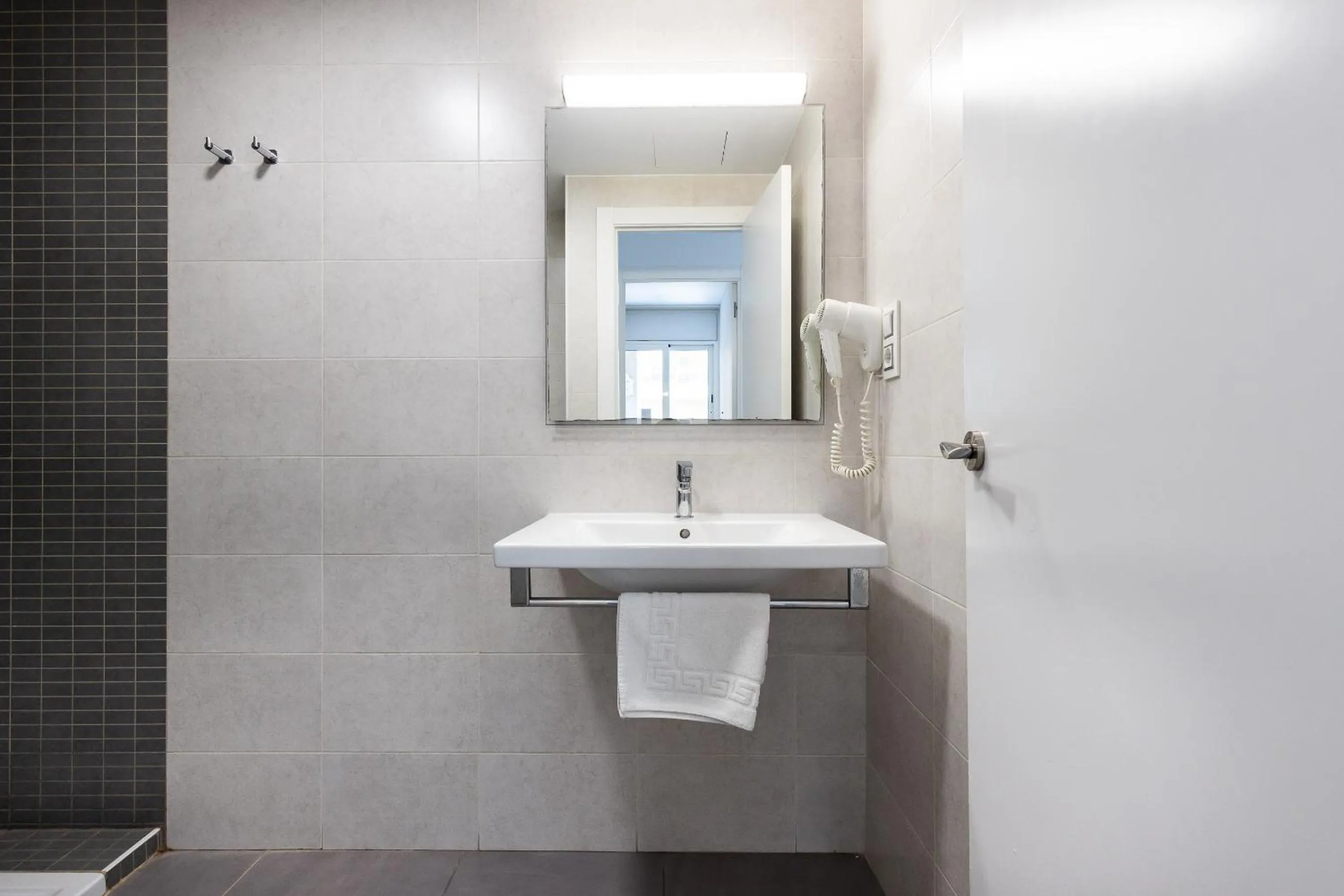 Shower in Rentalmar Zahara family suites