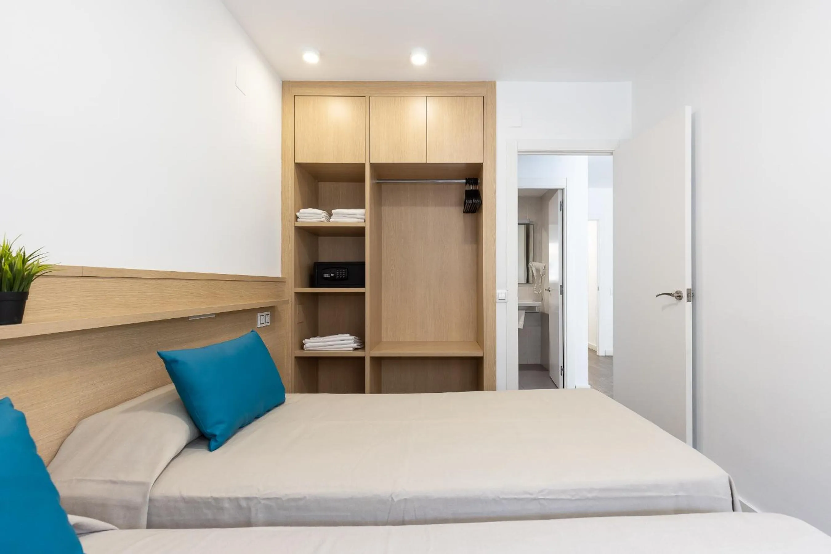 Bed in Rentalmar Zahara family suites