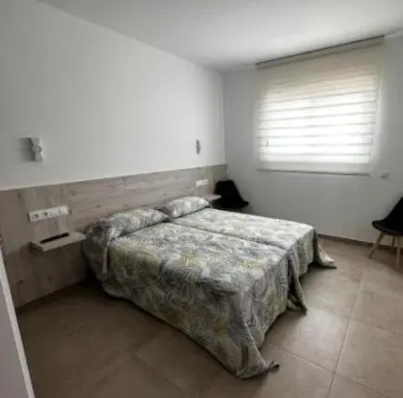 Twin Room in RAQUEL'S - Habitacions i Apartaments turístics - Twin Room in RAQUEL'S - Habitacions i Apartaments turístics -