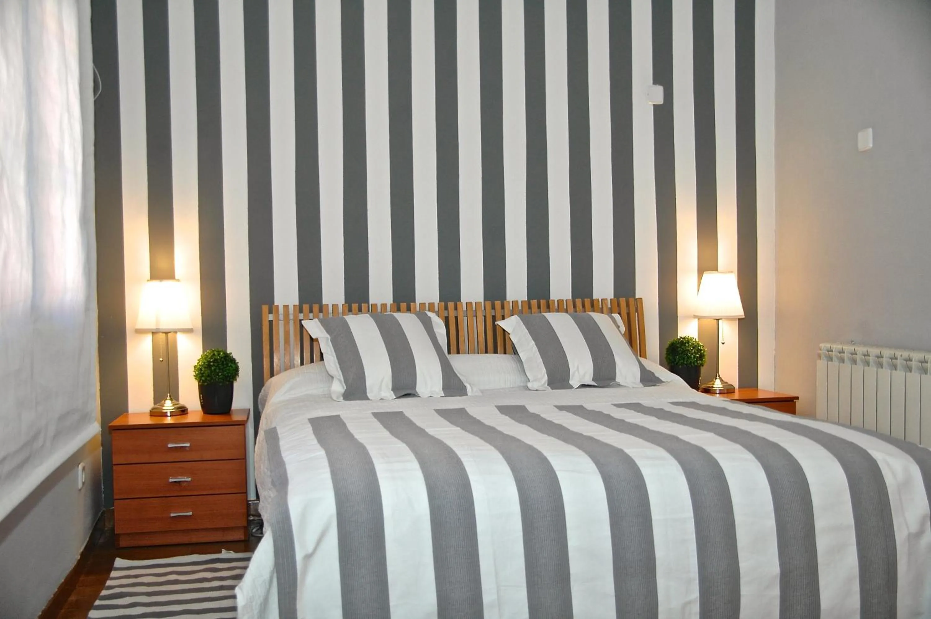 Bed in Hostal Cervantes