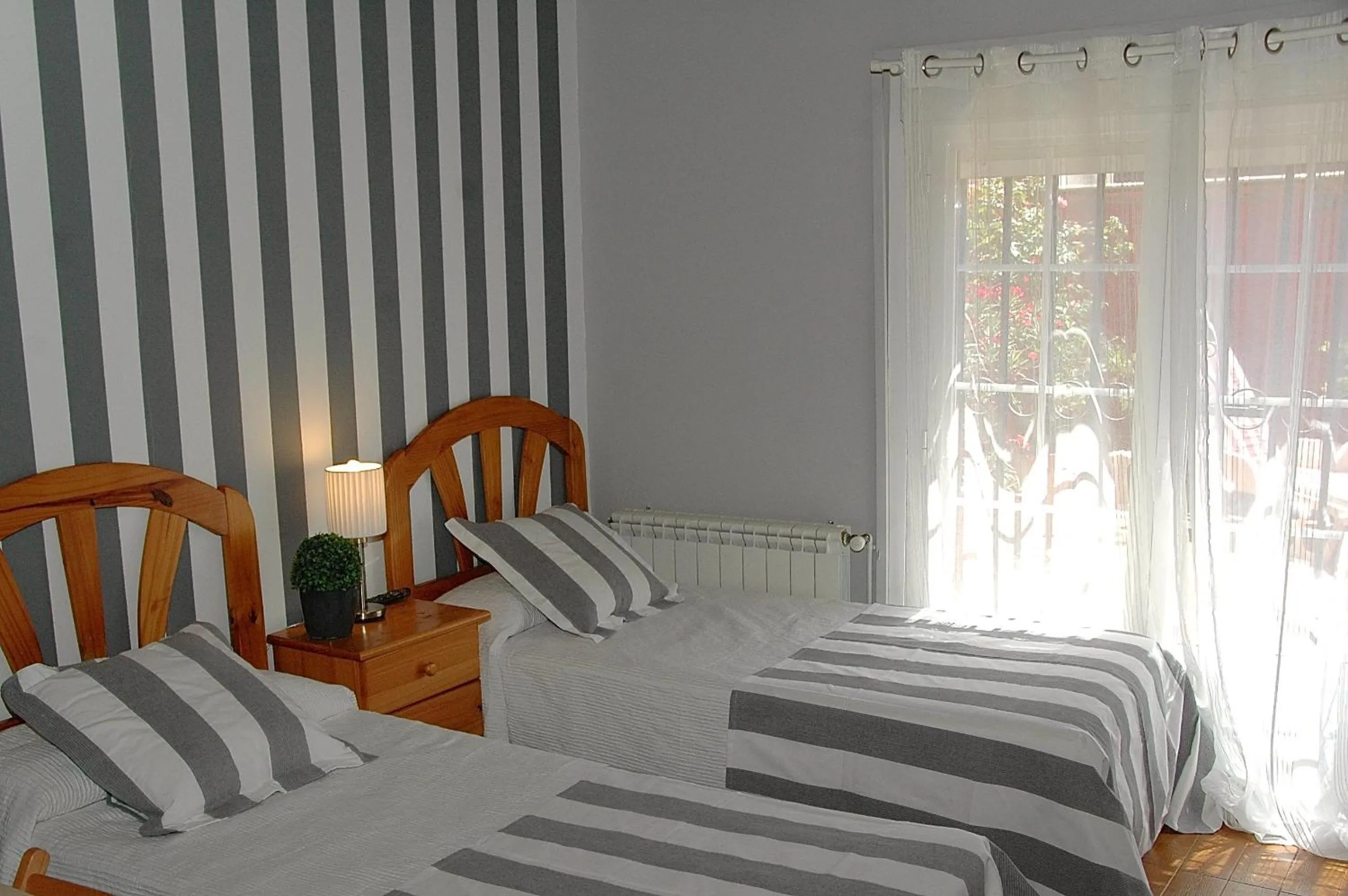 Bed in Hostal Cervantes