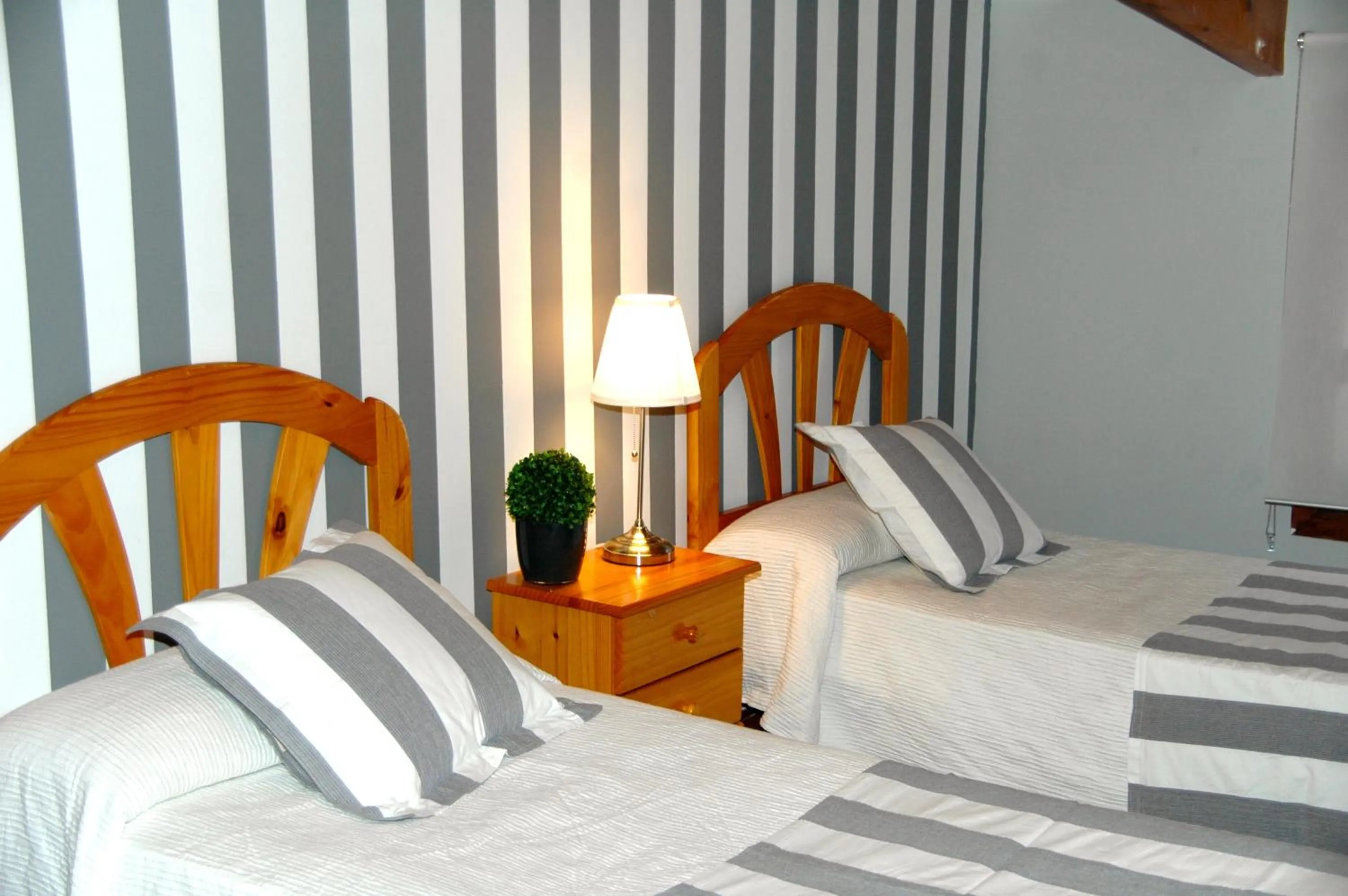 Bed in Hostal Cervantes