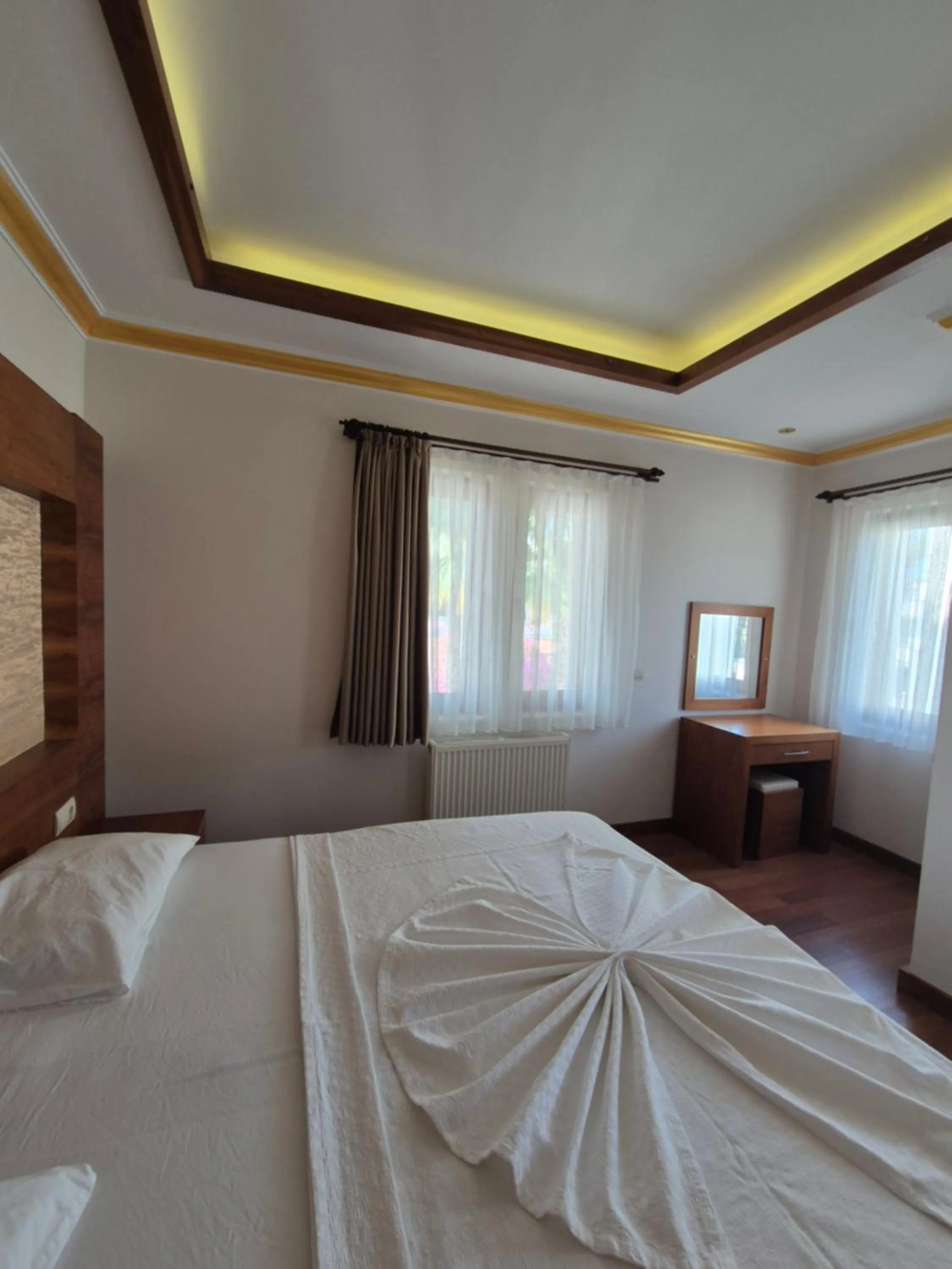 Bed in Dinara Apart Hotel