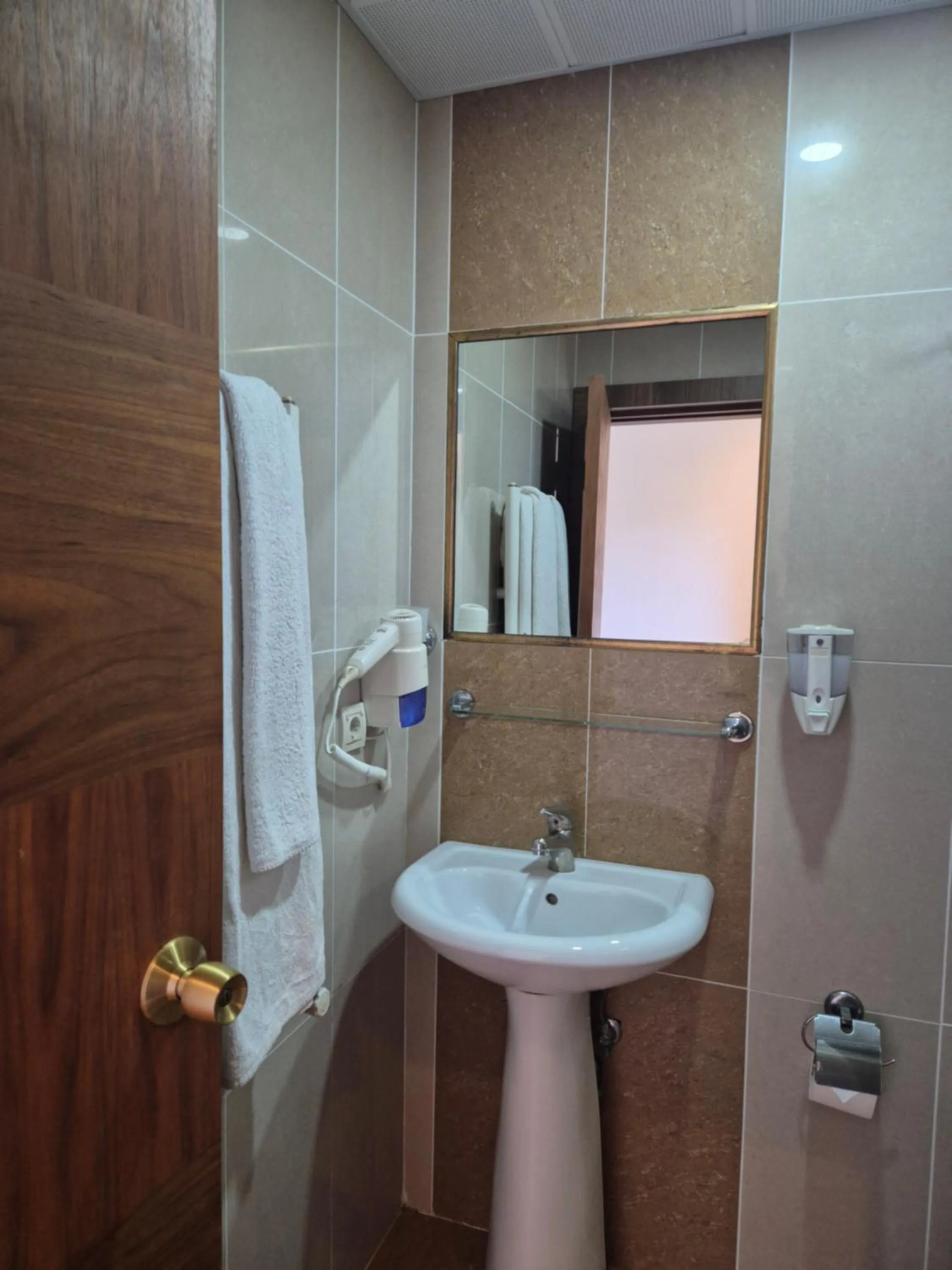 Bathroom in Dinara Apart Hotel