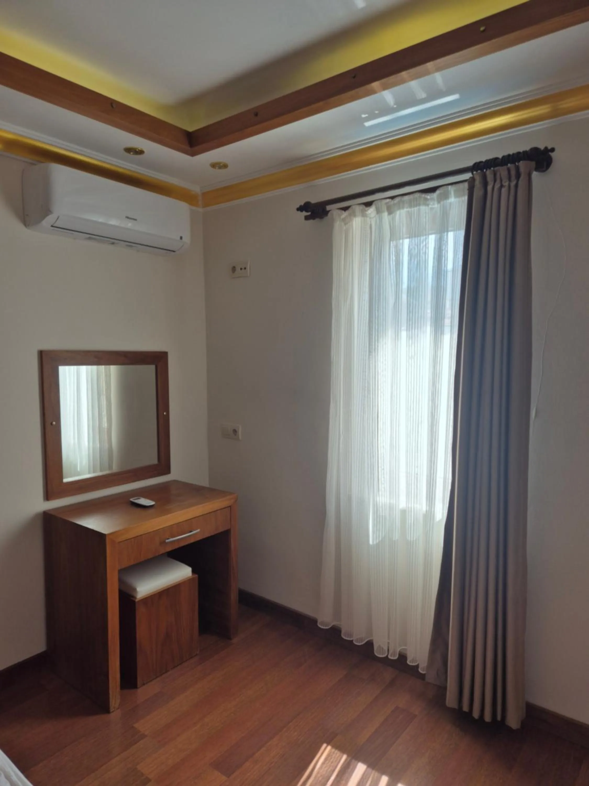 Bedroom in Dinara Apart Hotel