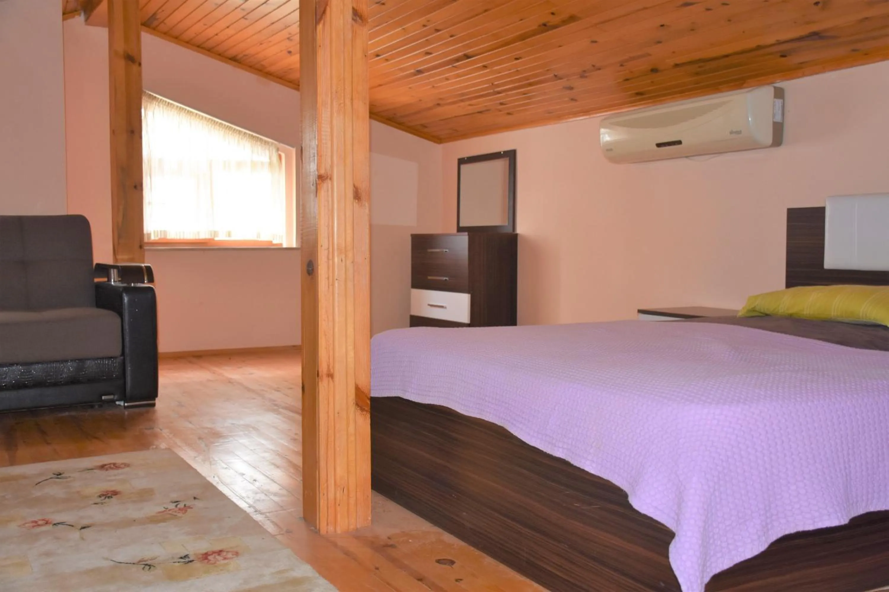 Bedroom in Dinara Apart Hotel